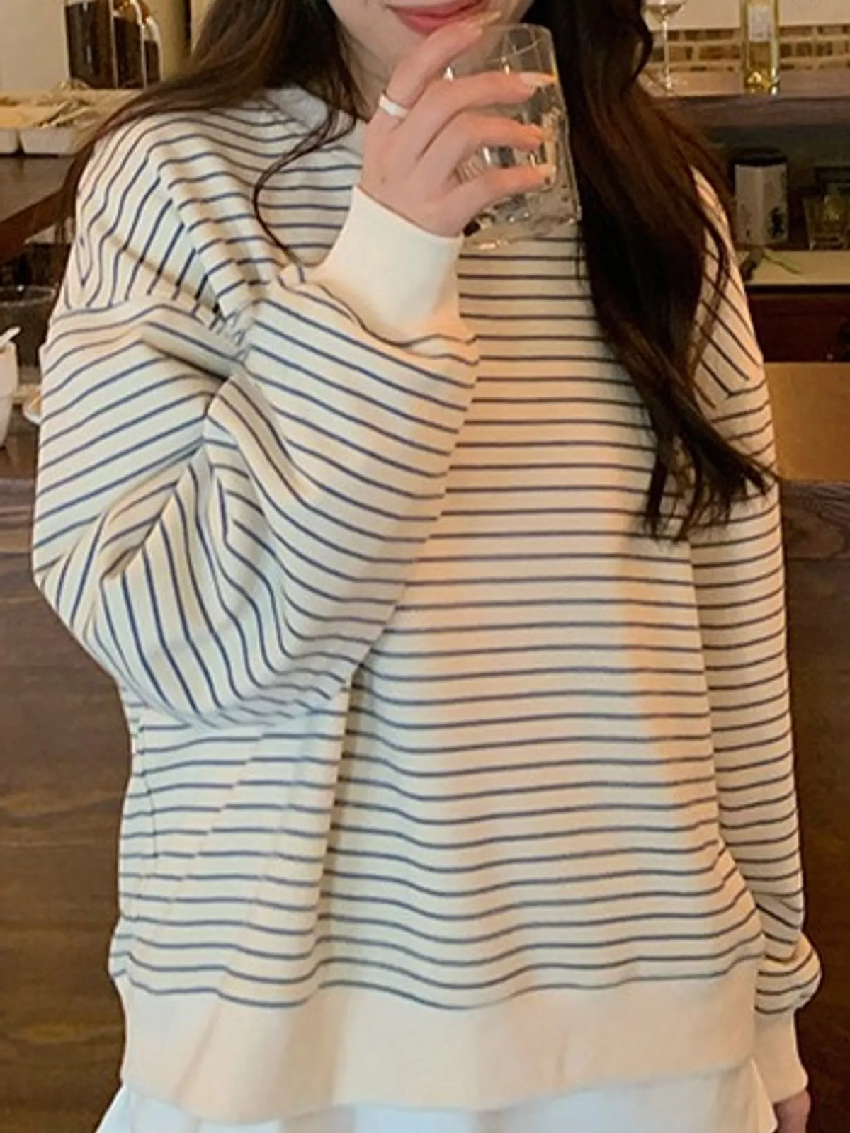 Cream and blue striped long sleeve crewneck t shirt, front view