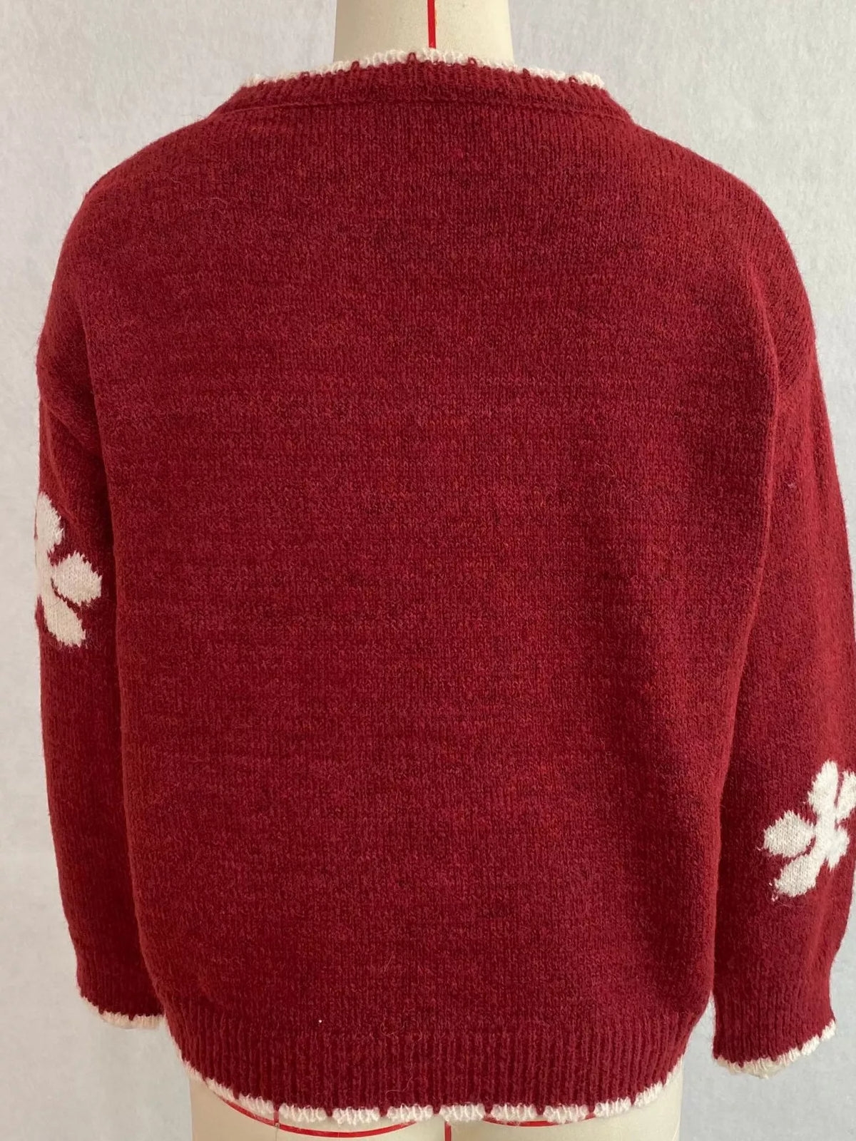 Floral-applique knit cardigan in burgundy, mannequin back view