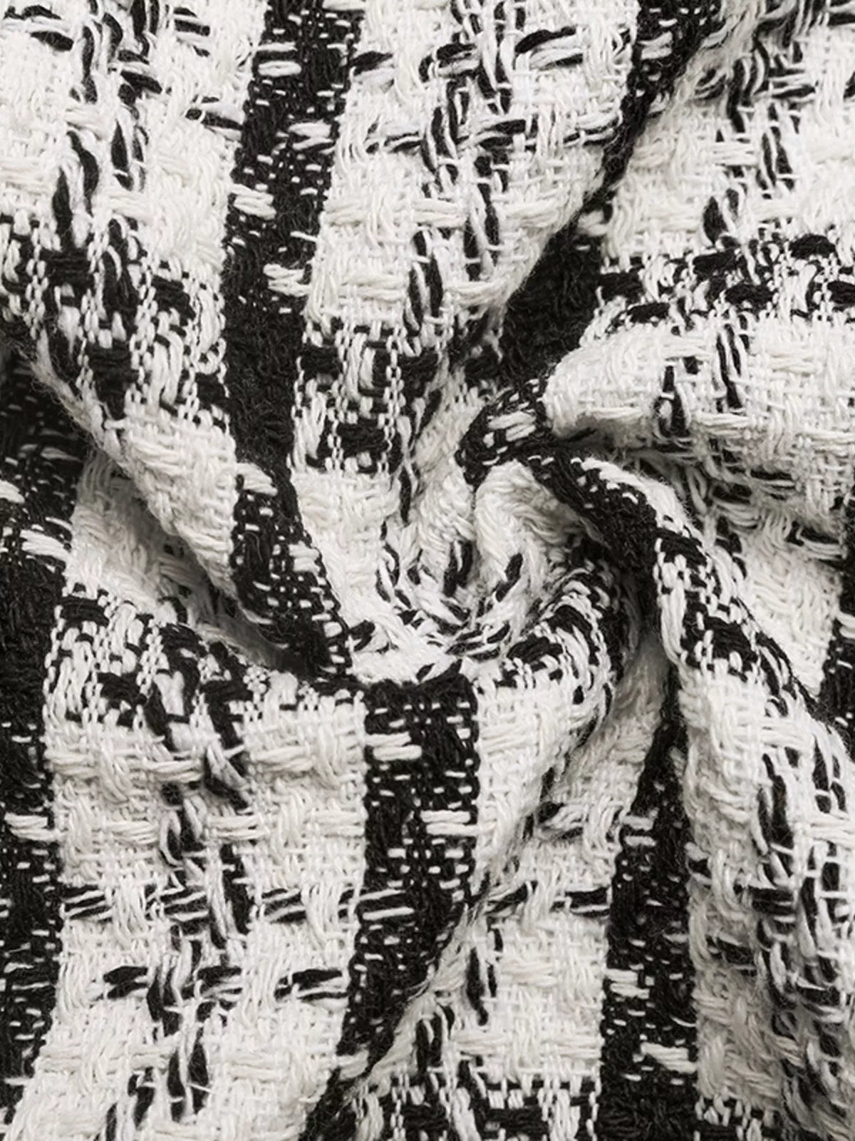Black and white plaid midi skirt, fabric close-up