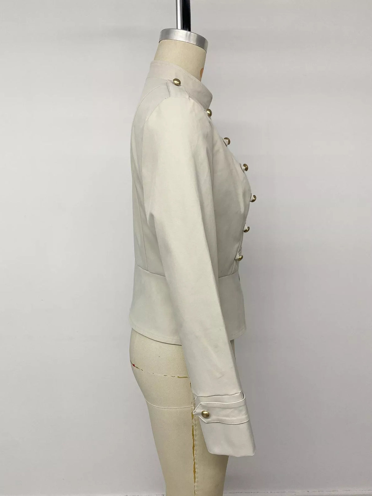 Apricot zip-up cropped jacket, side on mannequin