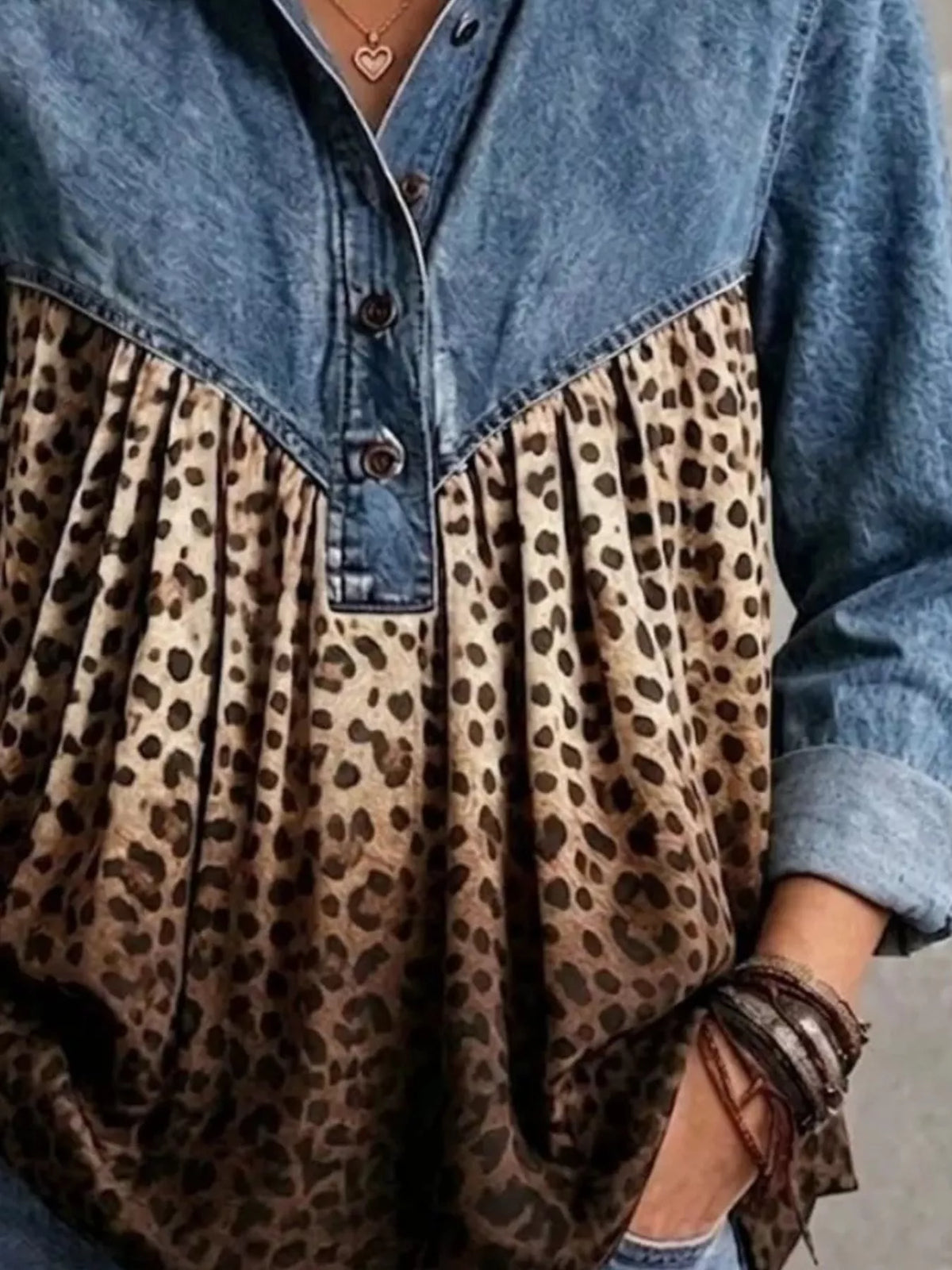 Light blue leopard-panel button-front blouse, button-placket and leopard-panel detail