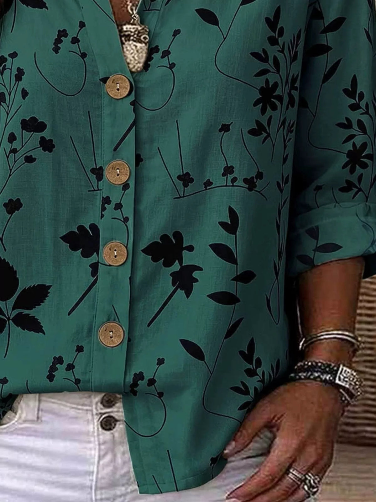 Notched-neck shirt, green black-floral buttons