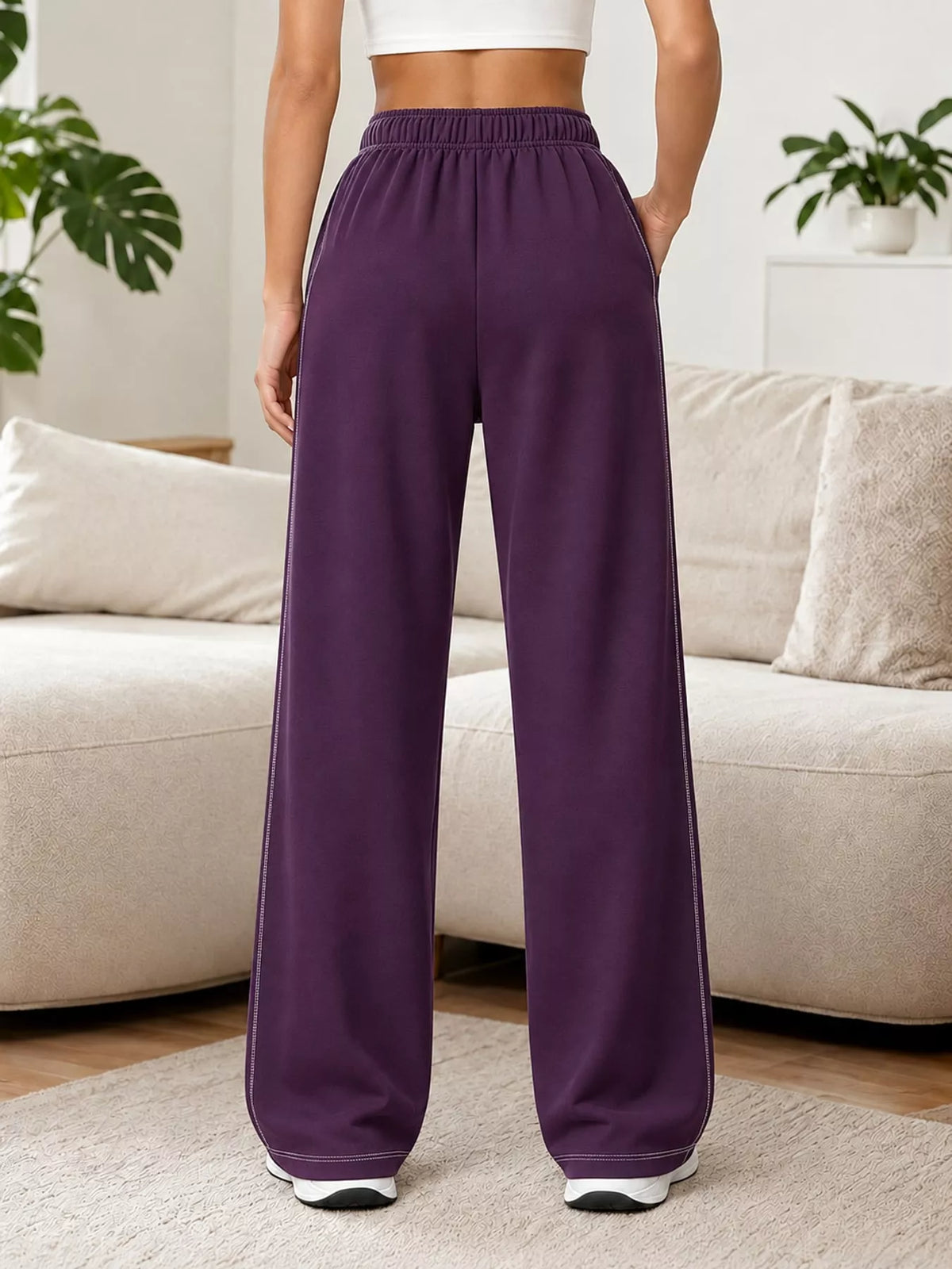 Purple wide-leg pants with drawstring, back view