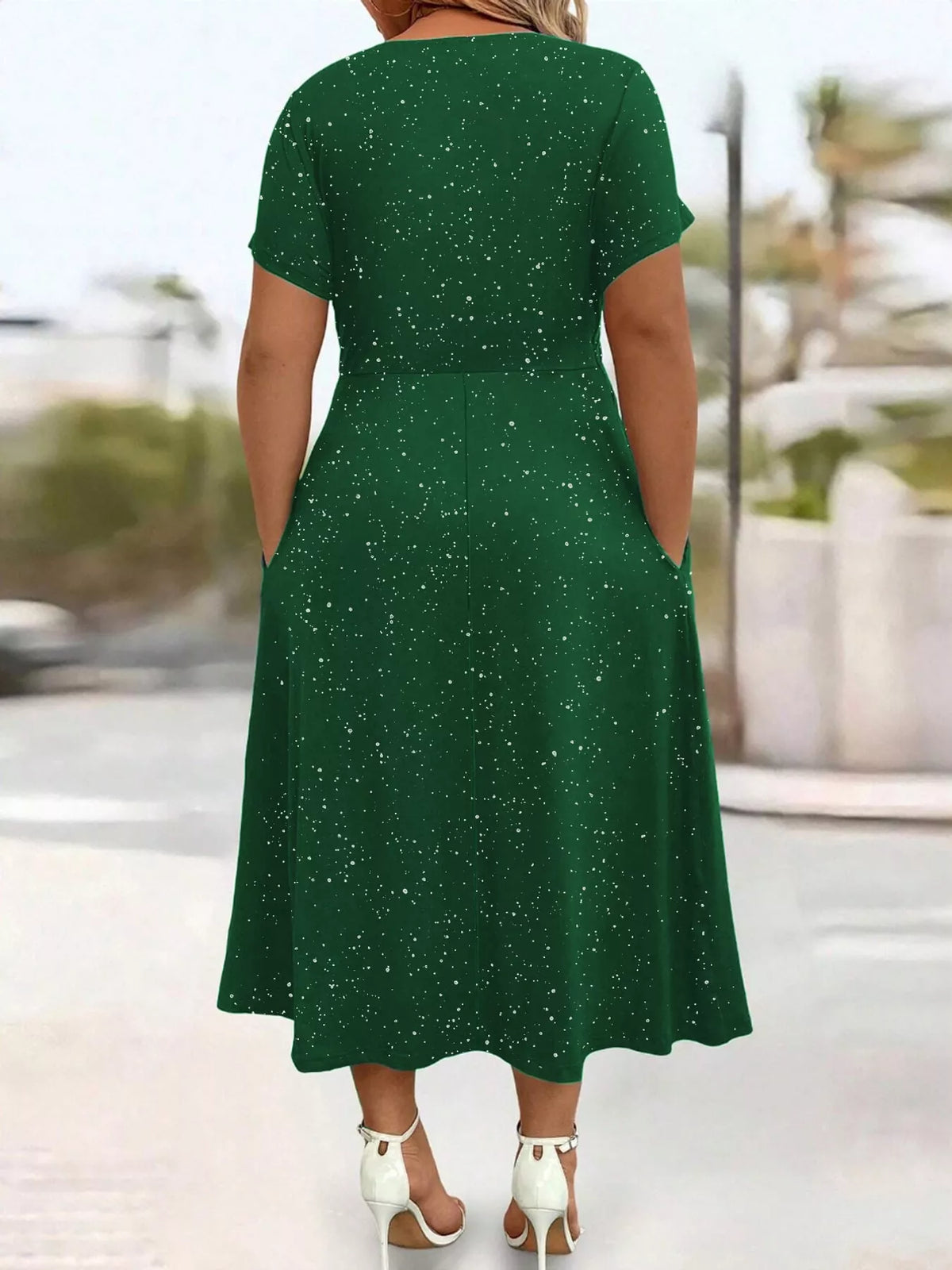 Green speckled short sleeve midi dress with pockets, back view