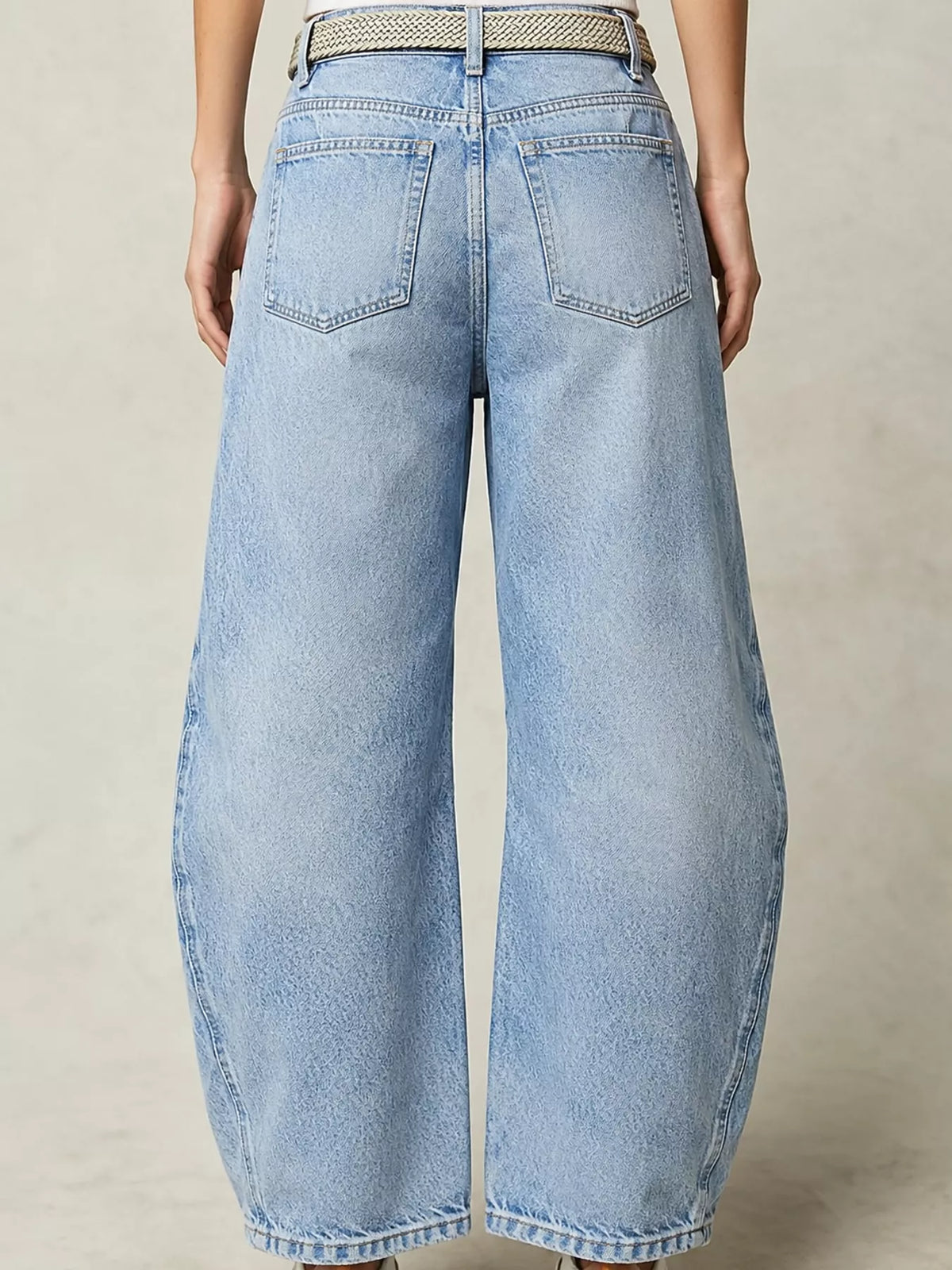 Light blue barrel-leg jeans, back view