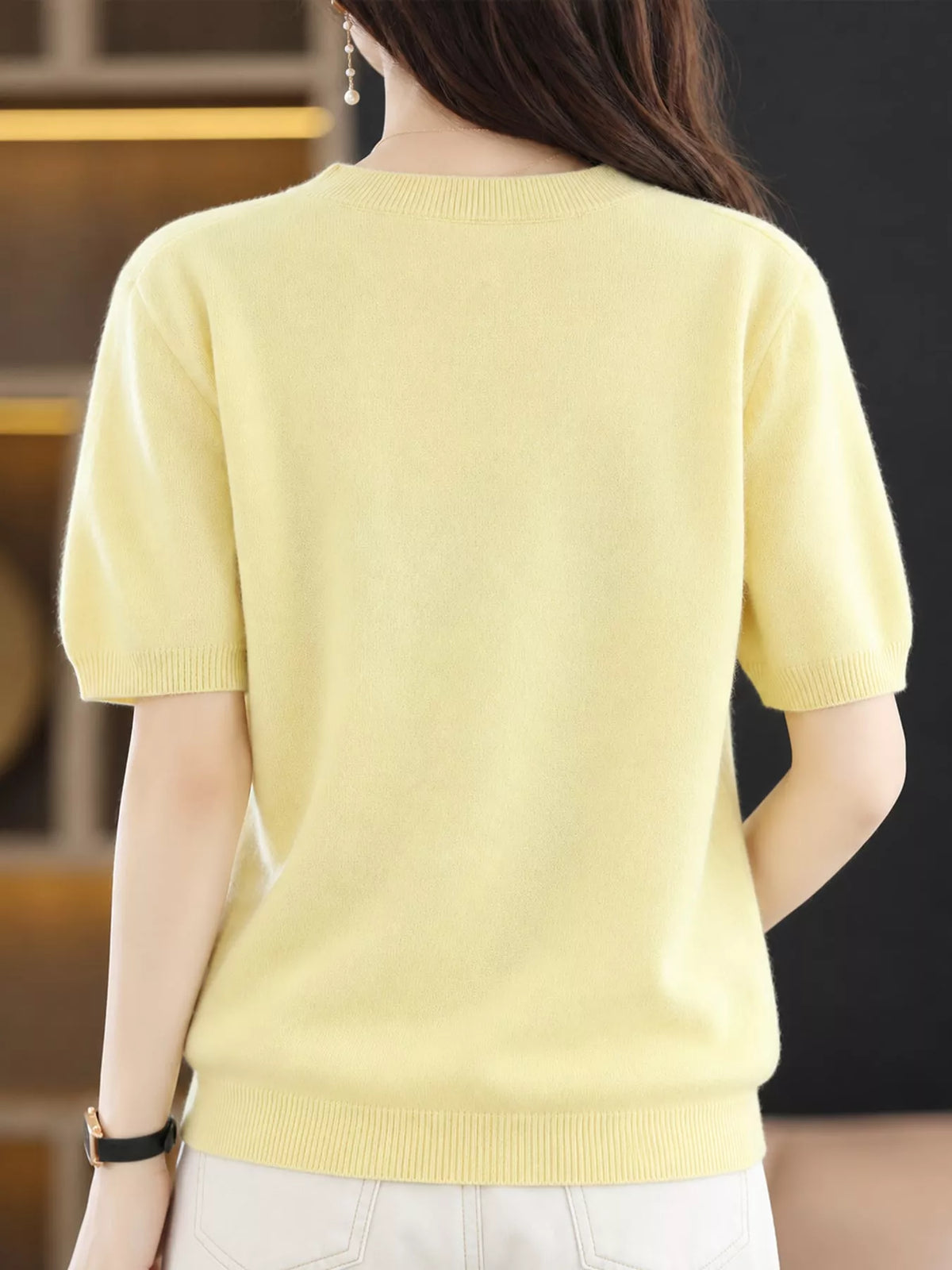 Yellow round neck short-sleeve sweater, back view