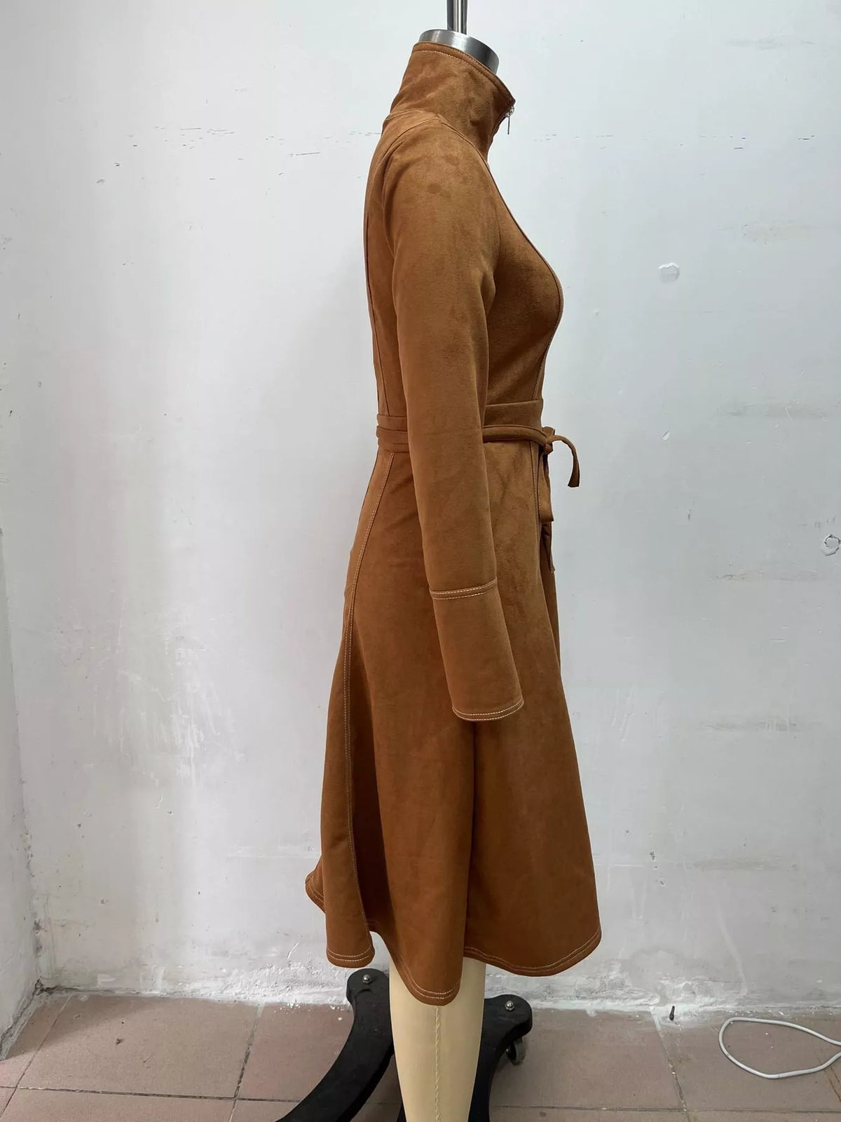 Brown zipper front midi dress, side view