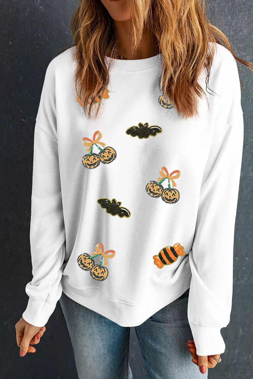 Sequin Halloween Pattern Pullover Sweatshirt in white, front view