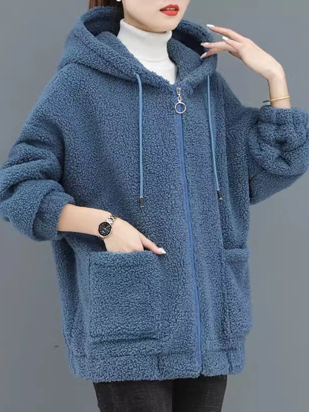 Blue fleece zip-up hoodie with pockets