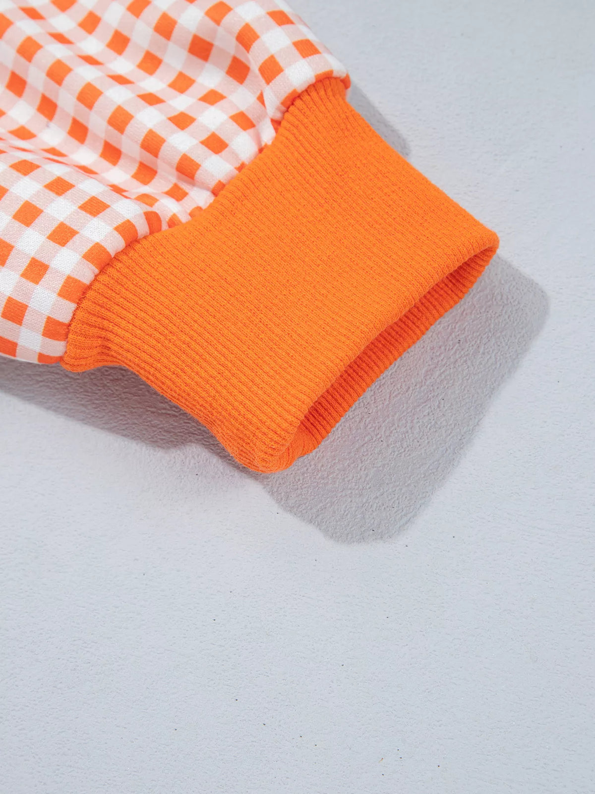 Orange gingham sleeve slogan sweatshirt, detail view