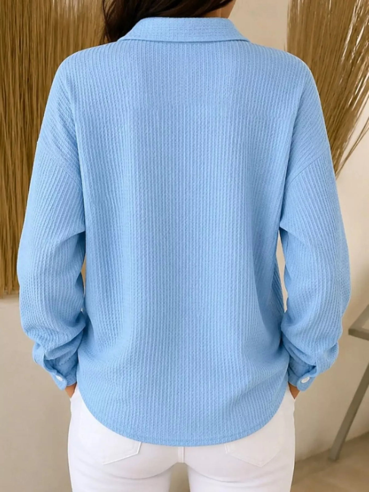 Blue waffle knit button-down shirt, back view
