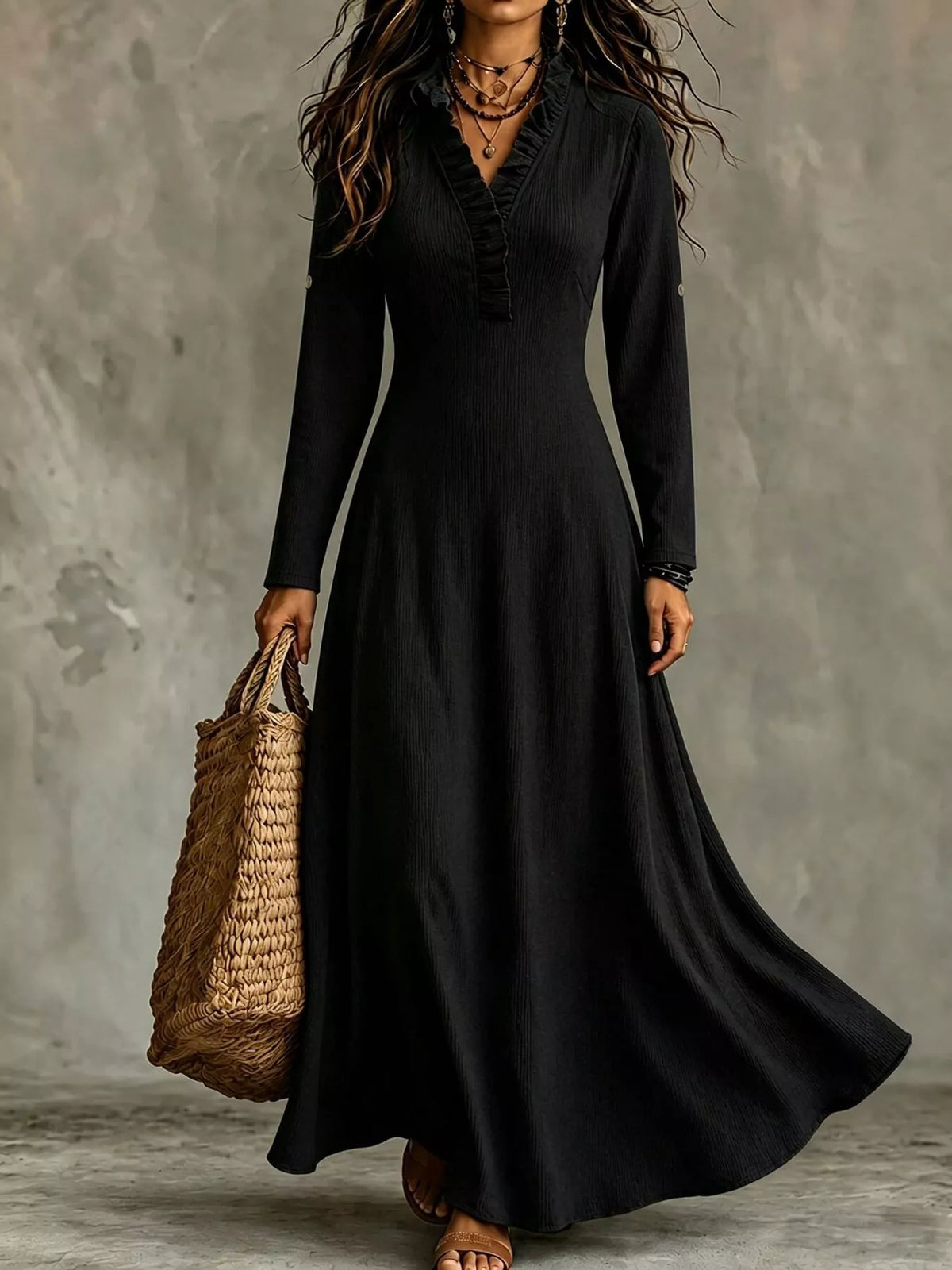 Black V-neck maxi dress, front view with sleeves down