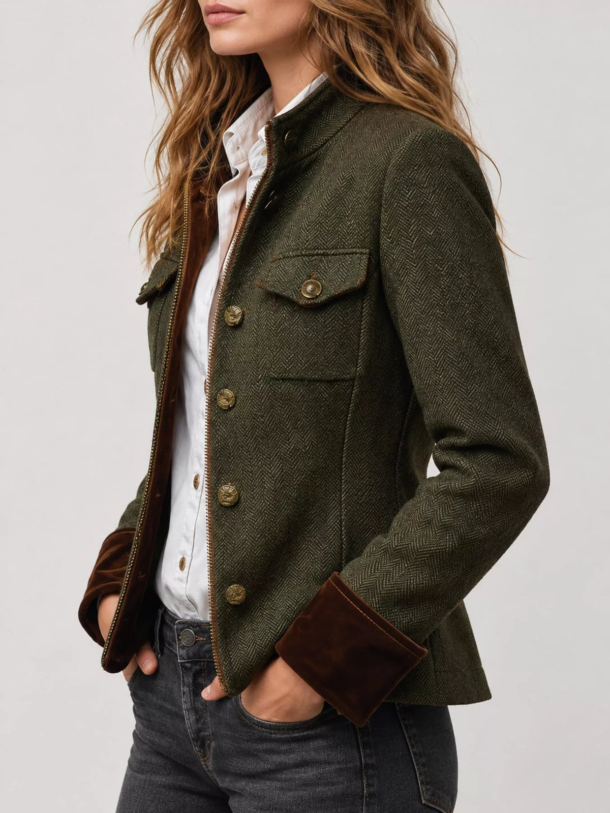 Green herringbone tweed blazer with velvet cuffs, side view