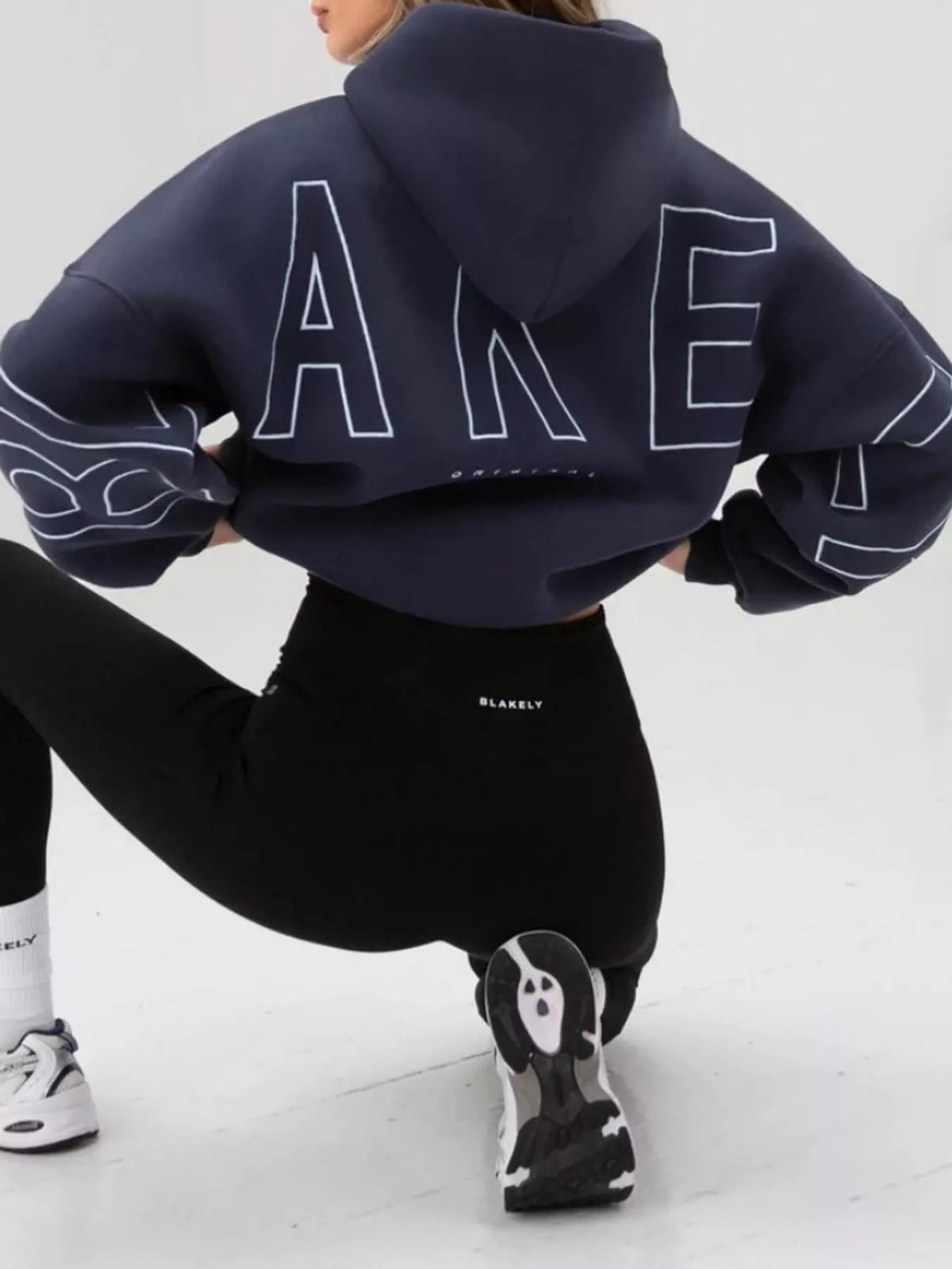Navy letter-print pullover hoodie with kangaroo pocket, back lettering view