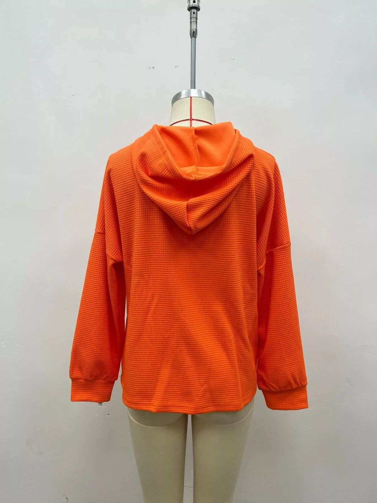 Women's Waffle Knit Drawstring Long Sleeve Hoodie in Orange, back view
