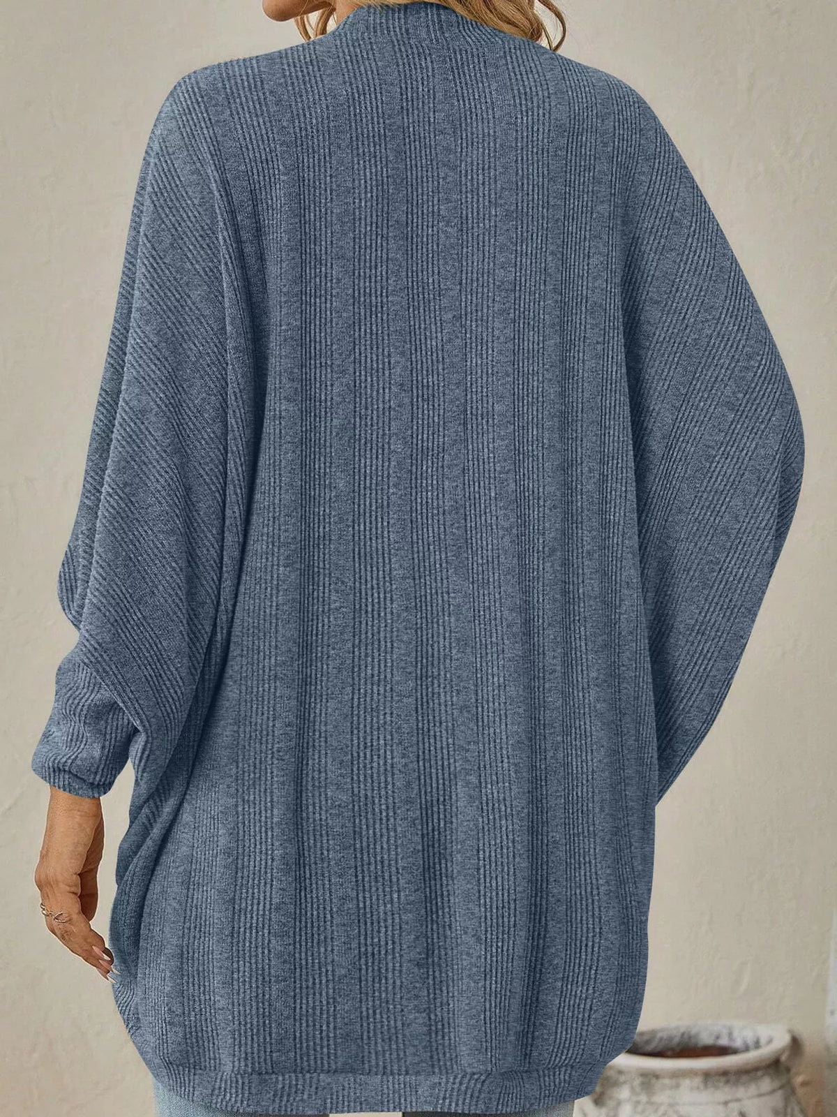 Blue open-front batwing sleeve ribbed cardigan, back view