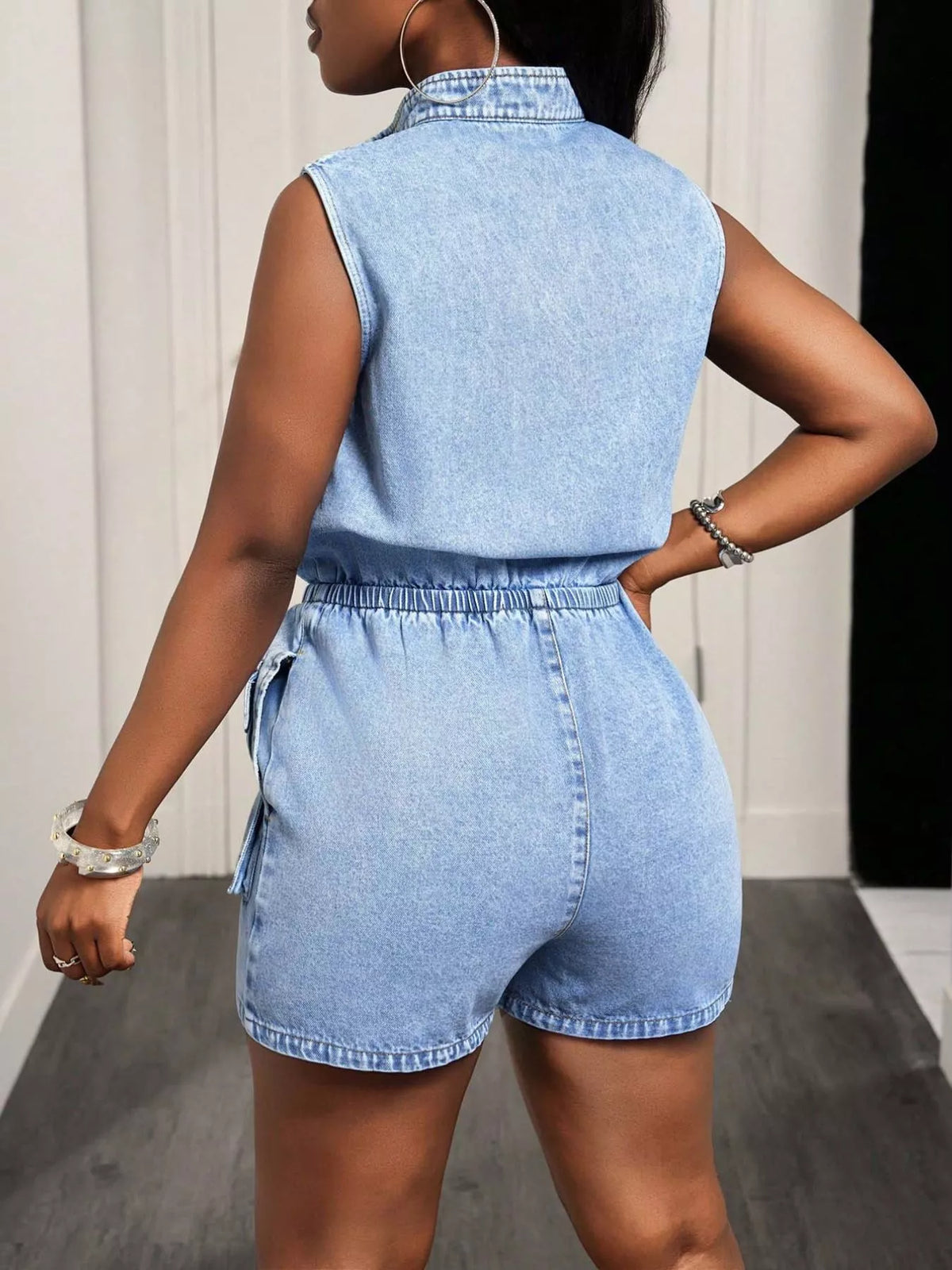 Women's Sleeveless Zip-Front Denim Romper in Blue, full-length view