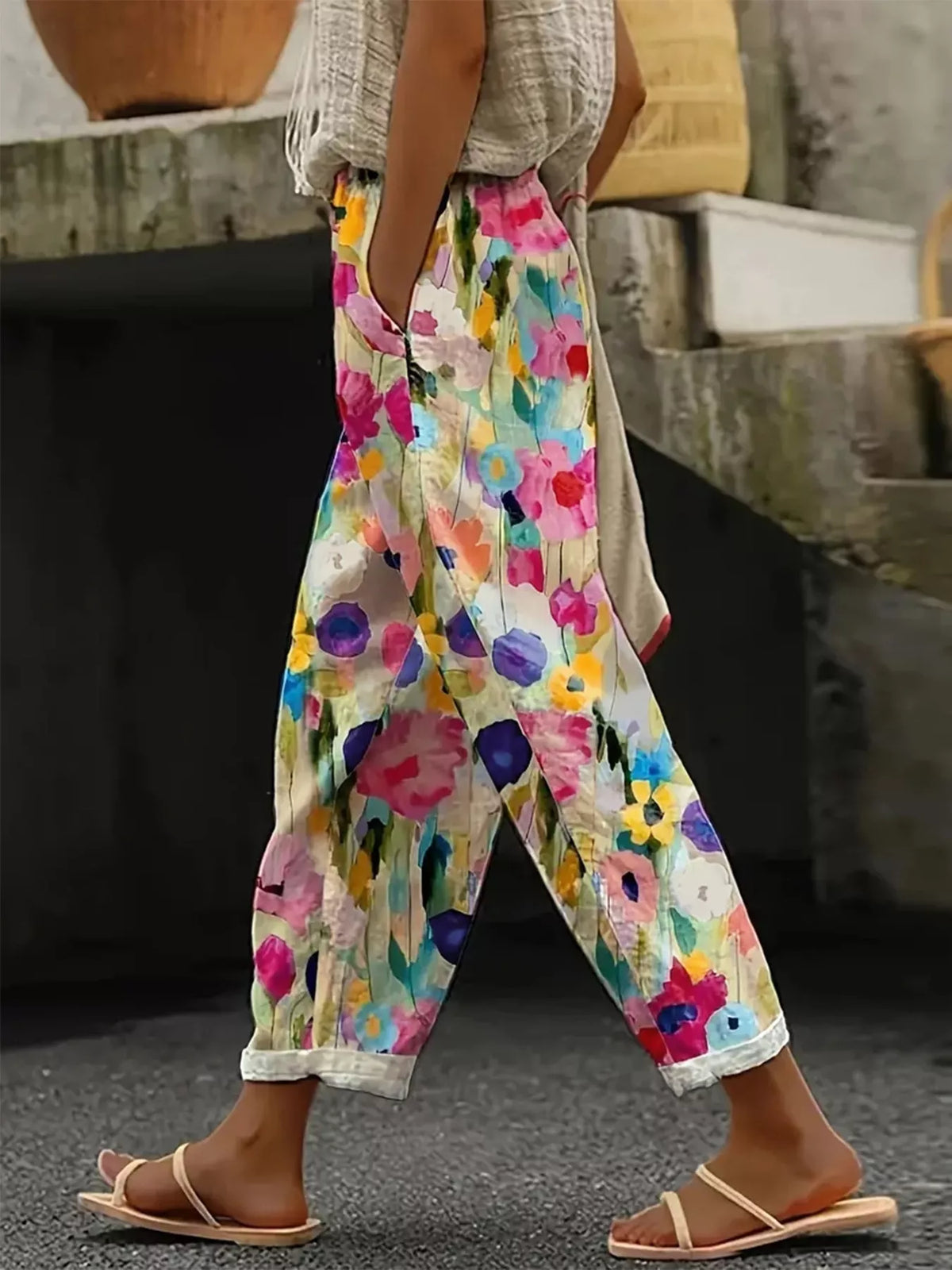 Multicolor floral tapered pants, side view, yellow floral print