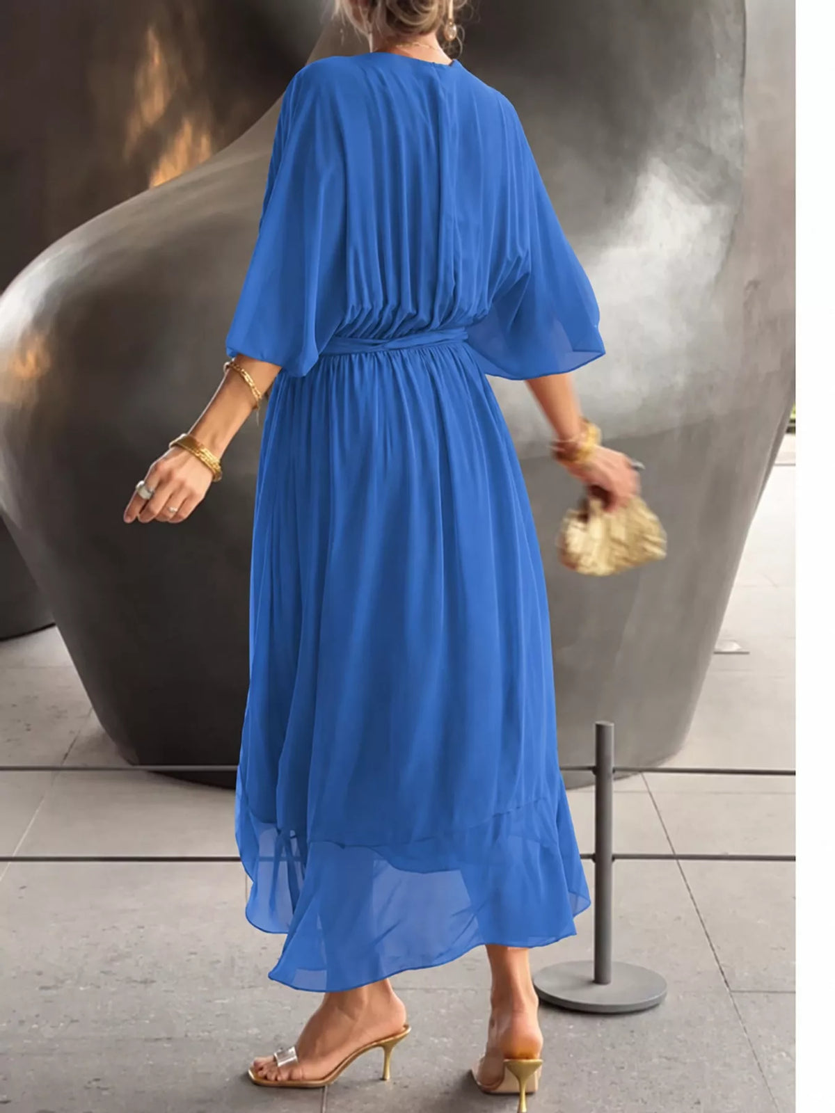 Blue batwing sleeve wrap dress with waist tie, back view