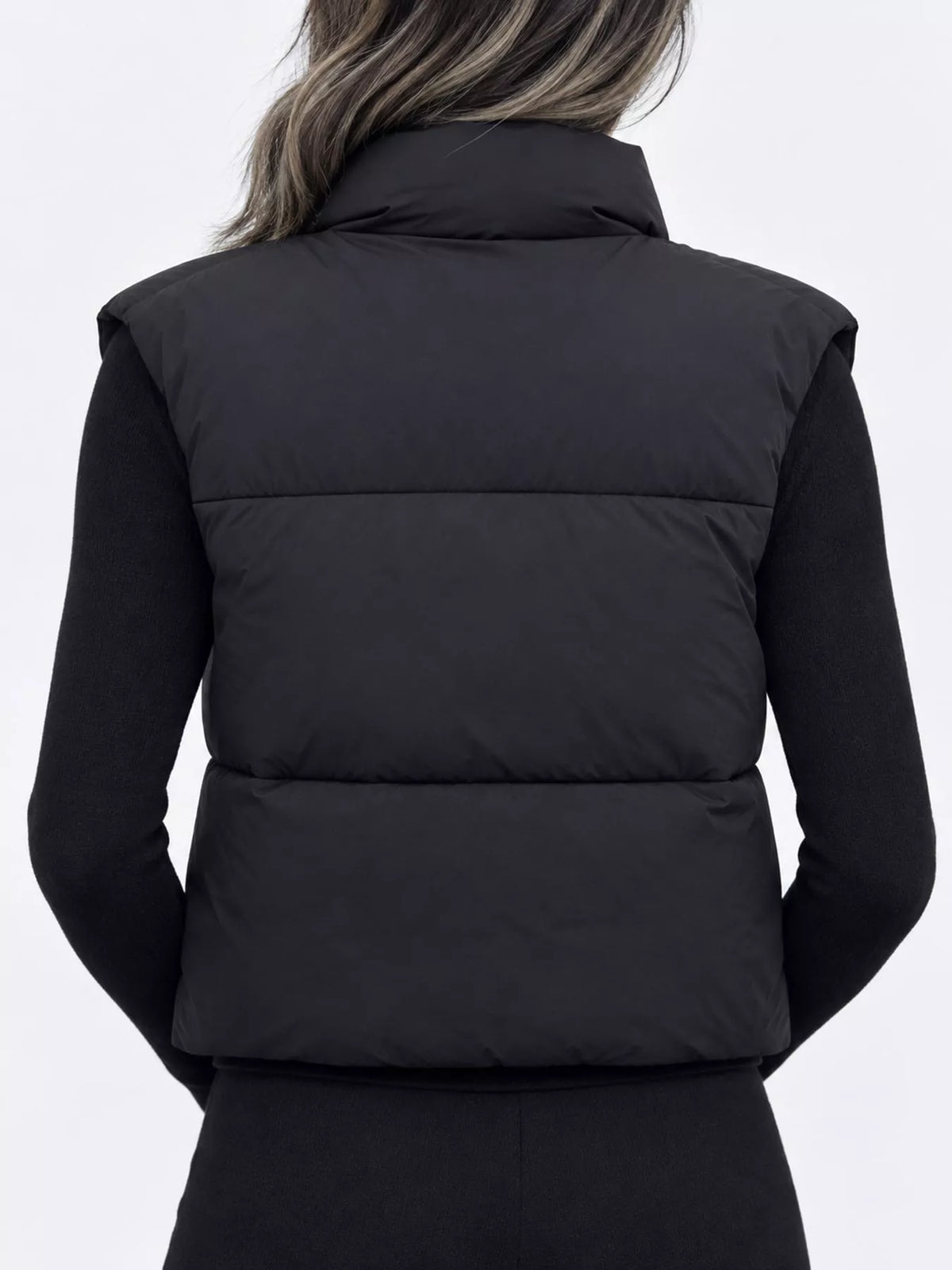 Cropped Zip-Up Puffer Vest in black, back view
