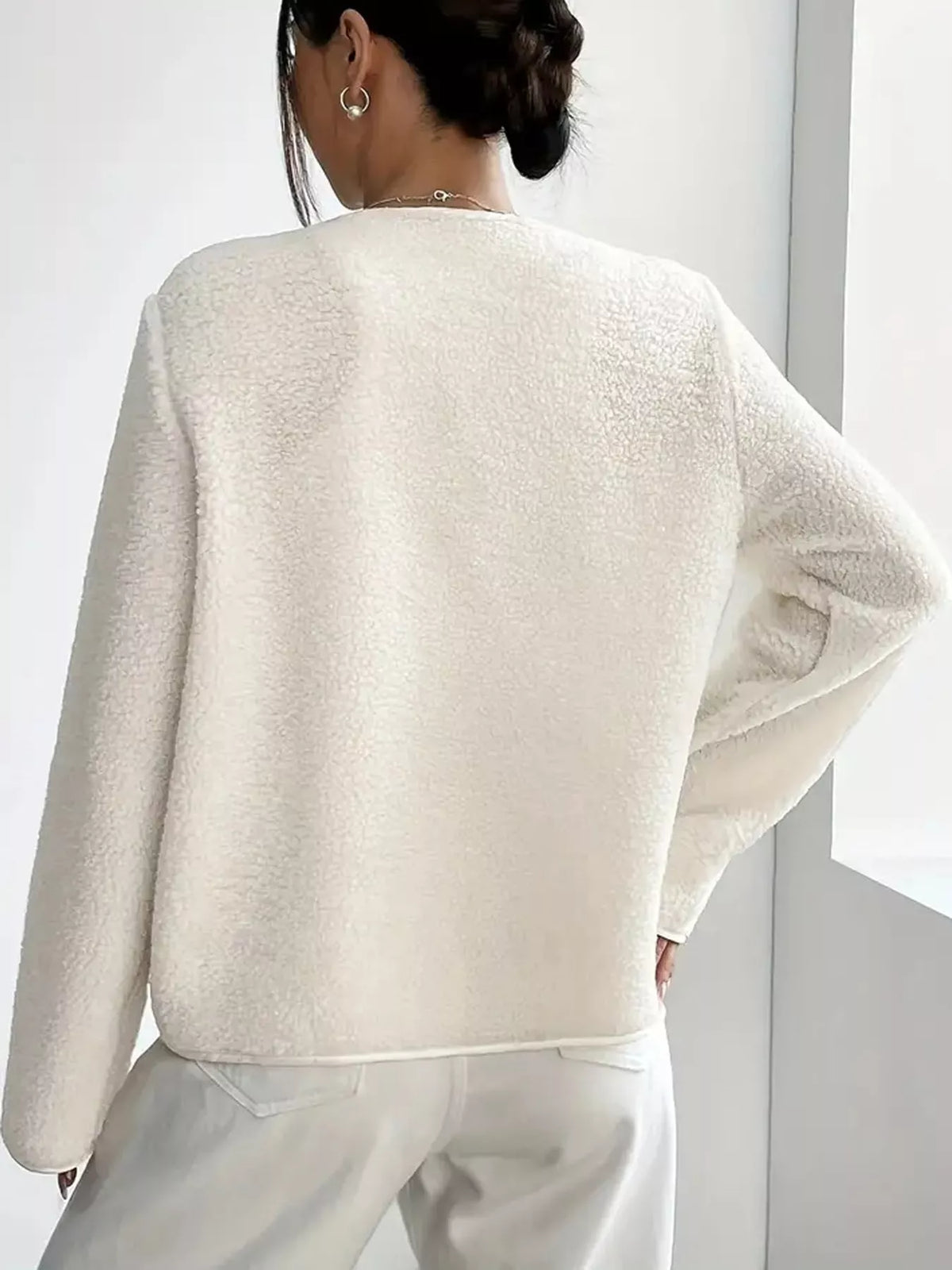 White textured button-front jacket — back view