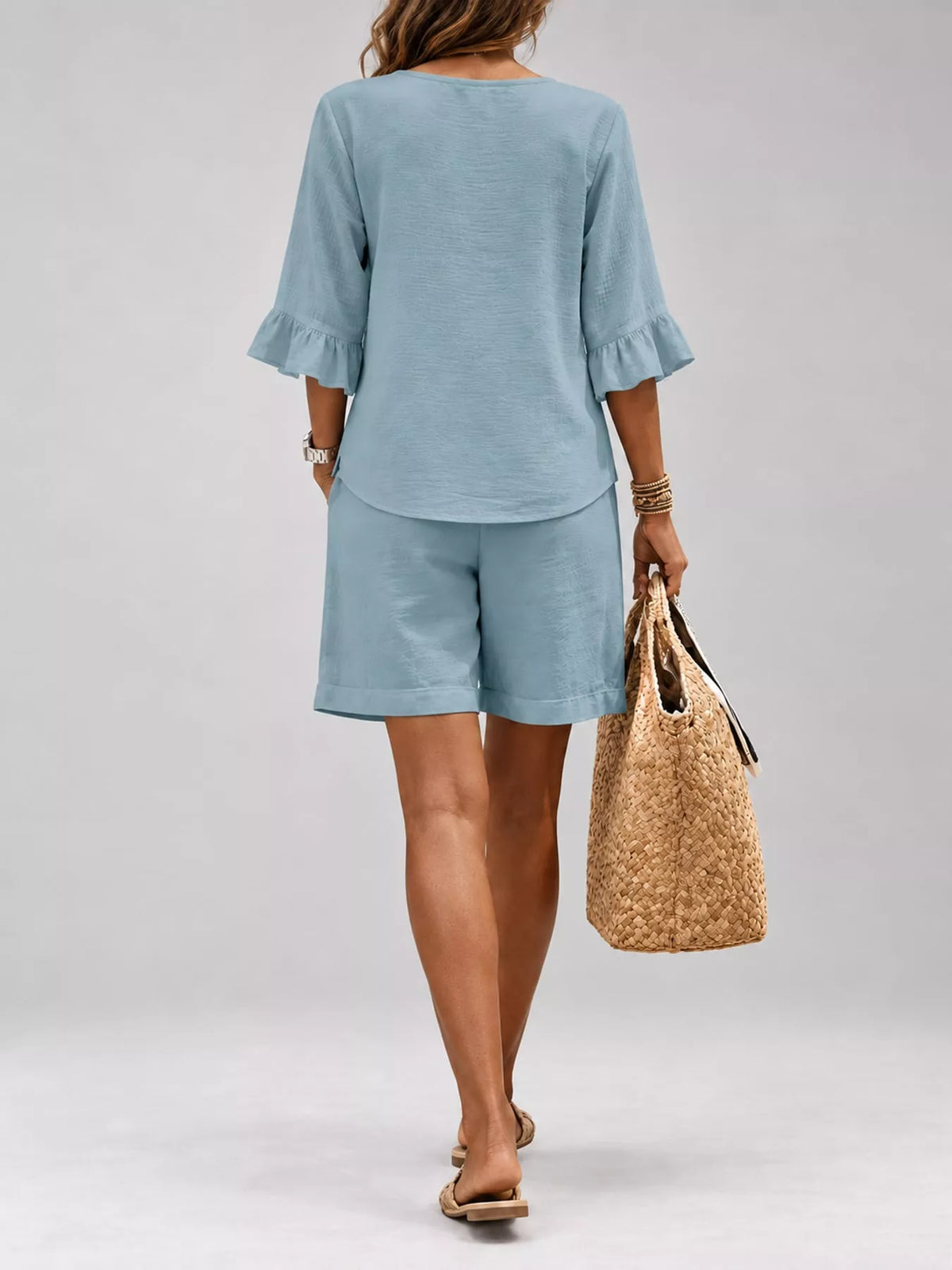 Decorative Button Blouse and Shorts Set, back view in light blue
