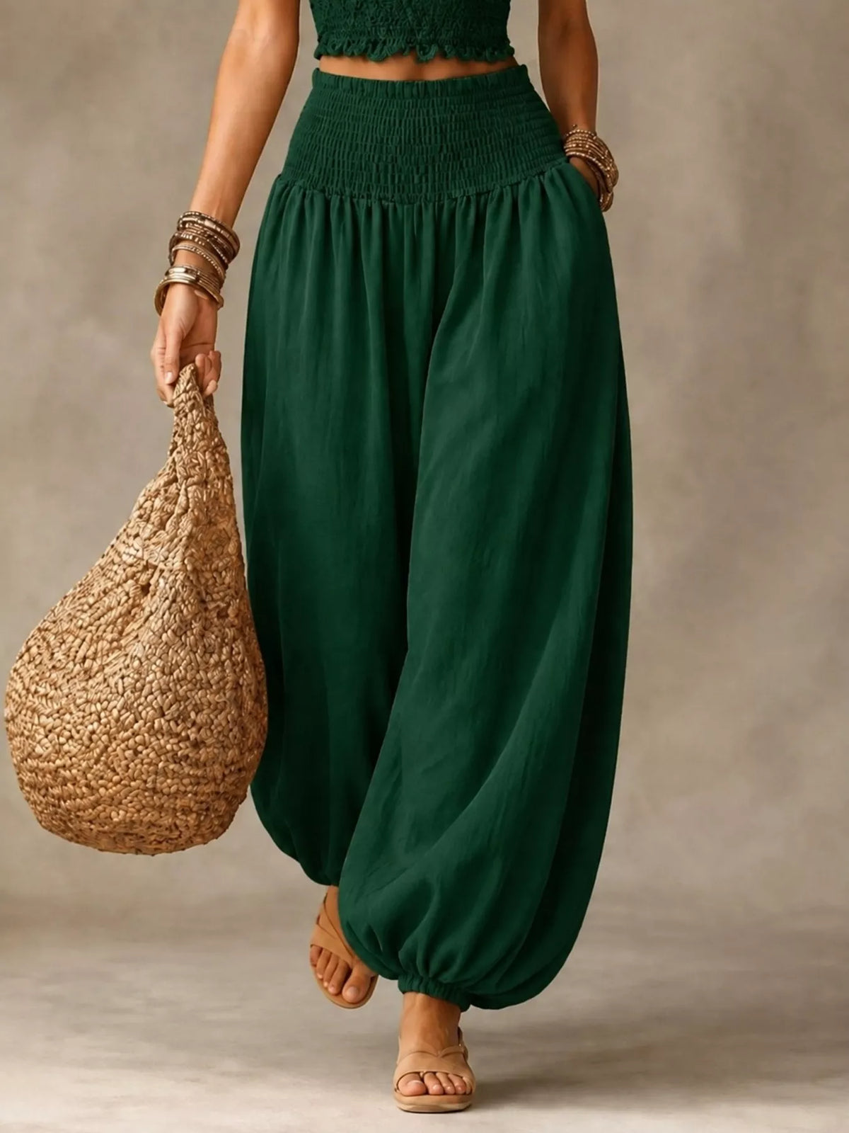 Women's Smocked Harem Pants in green — front view