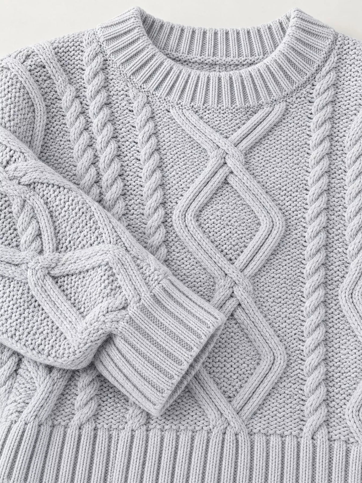 Gray cable-knit round neck sweater, detail view