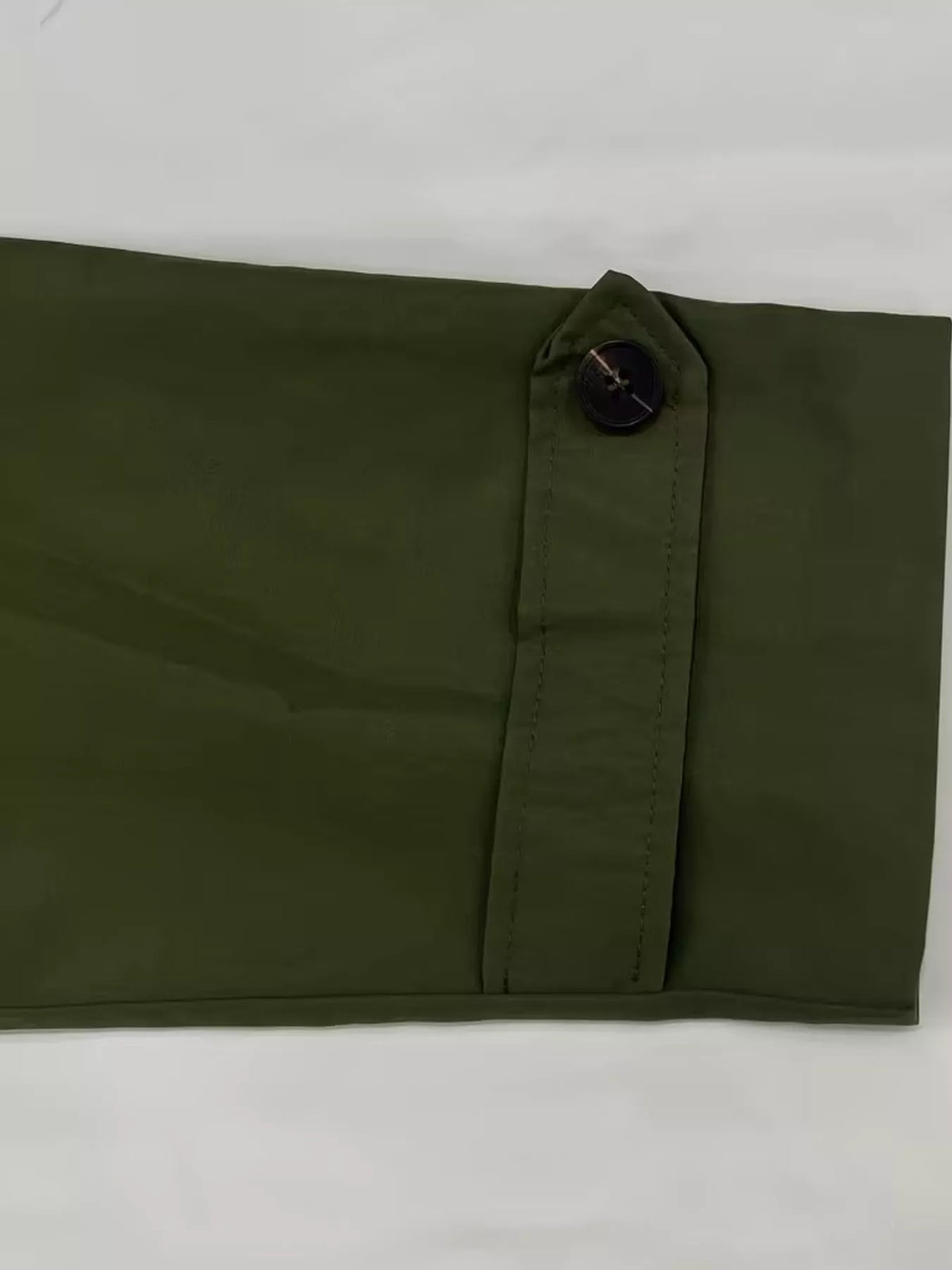 Women's Double-Breasted Belted Trench Coat in olive — cuff detail view