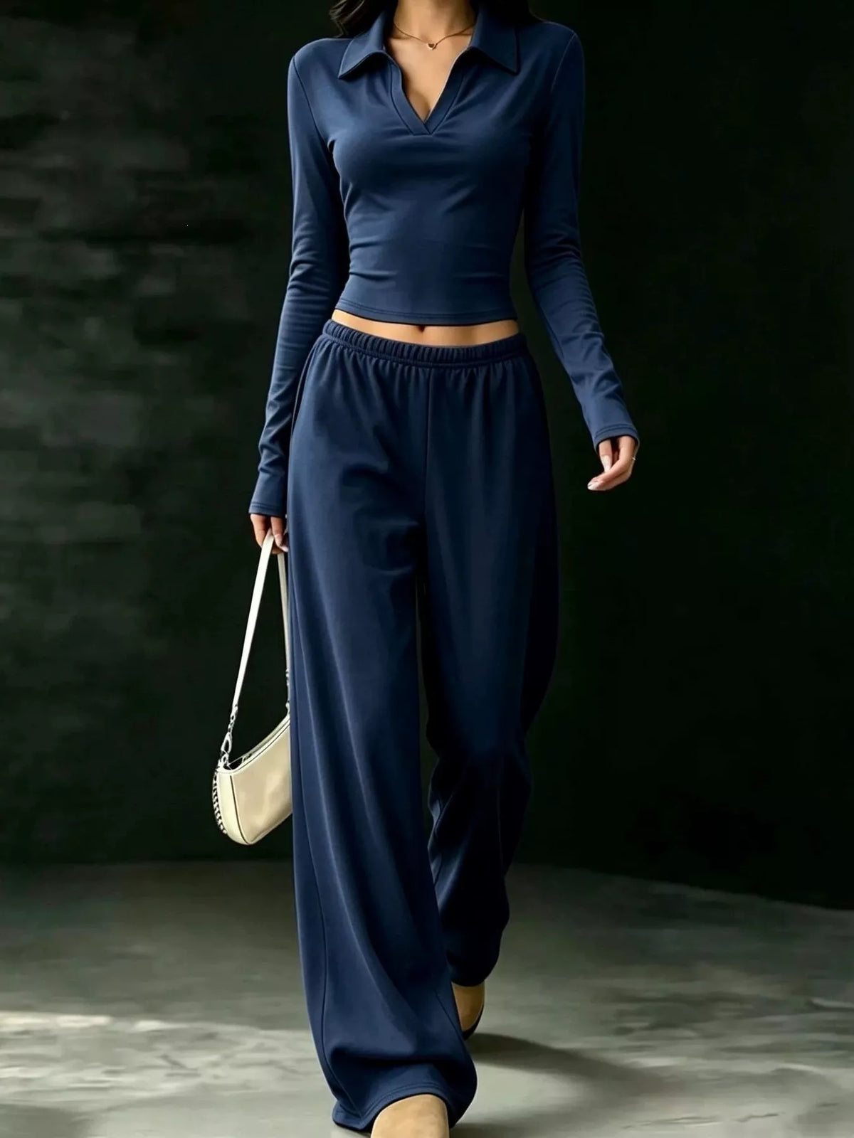 Navy collared crop top and wide-leg pants set, front walking view