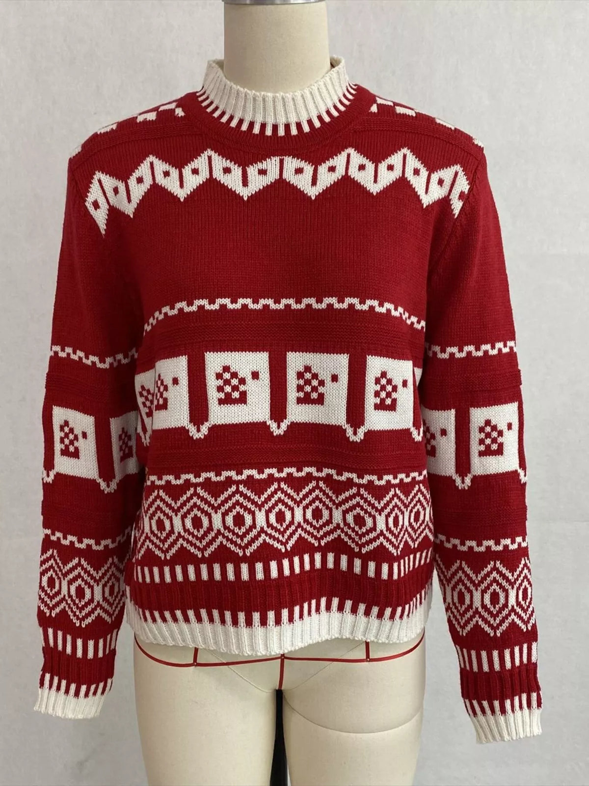 Red and white christmas fair isle crewneck sweater, front on dress form.