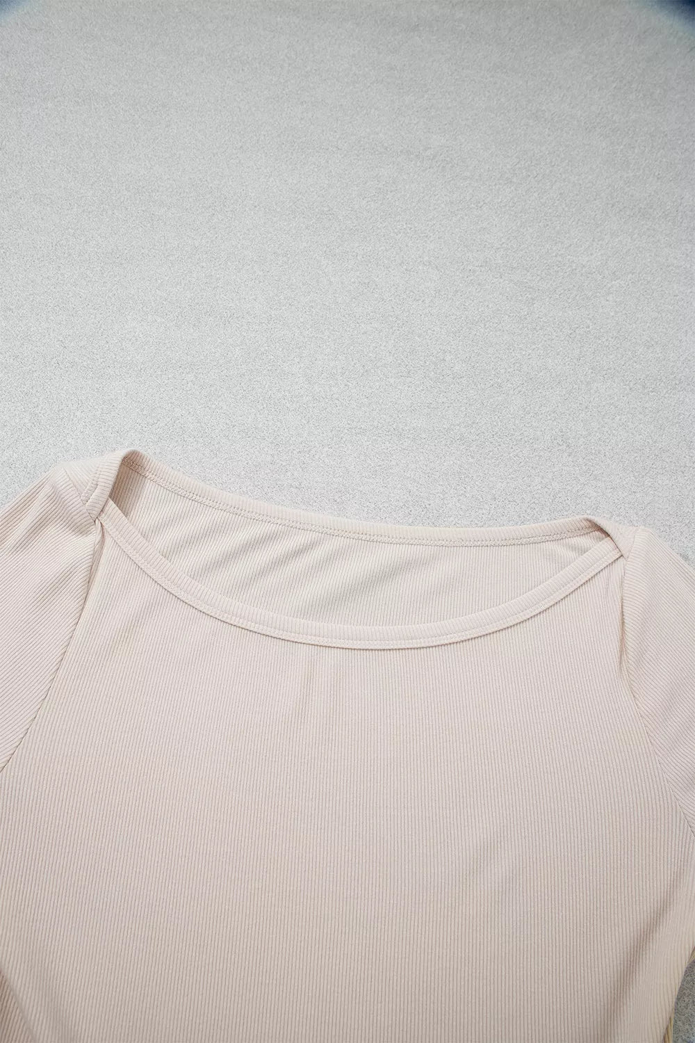 Beige lace-cuff long sleeve top, neckline detail