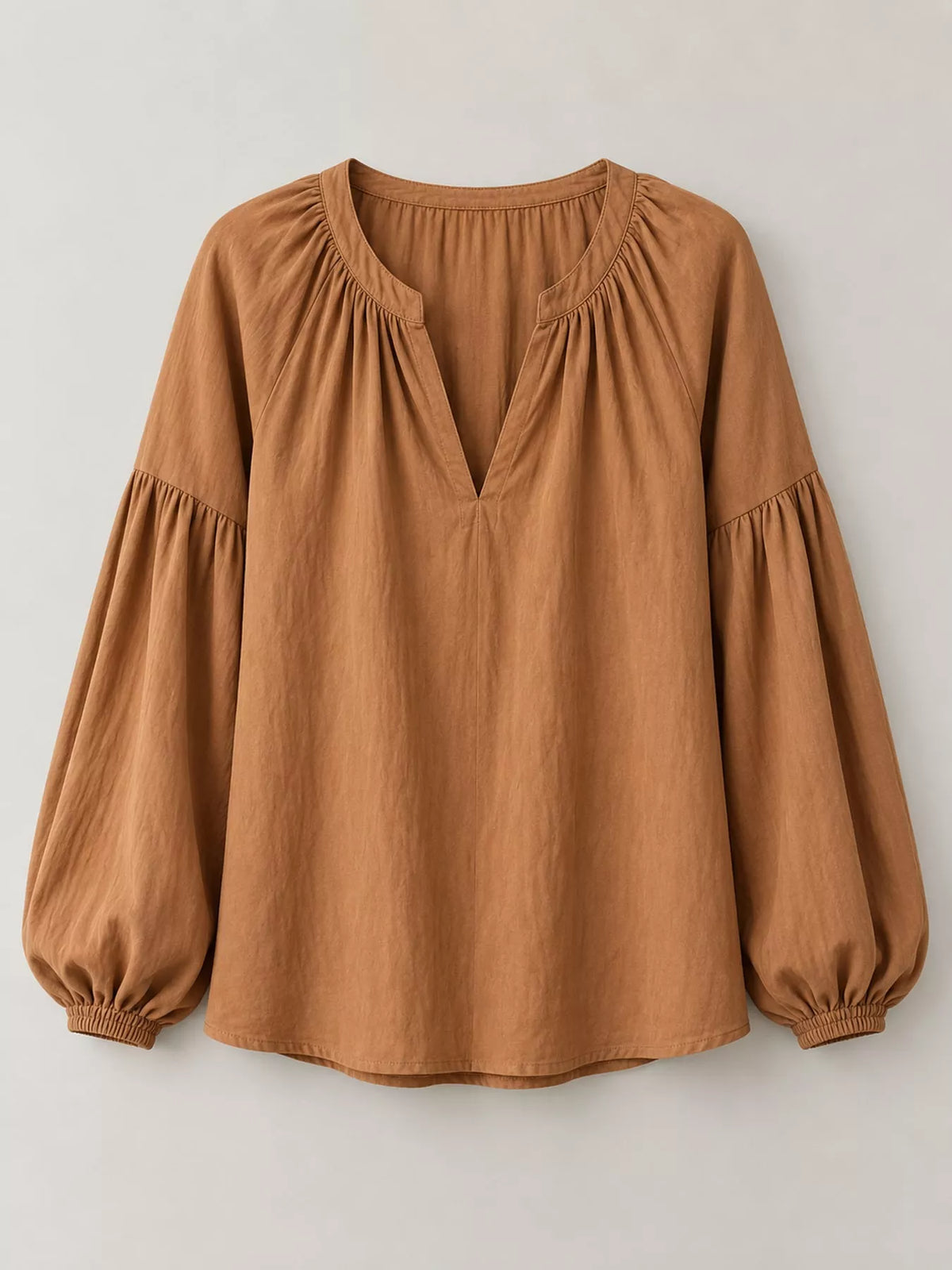 Notched Balloon Sleeve Blouse in brown, front view