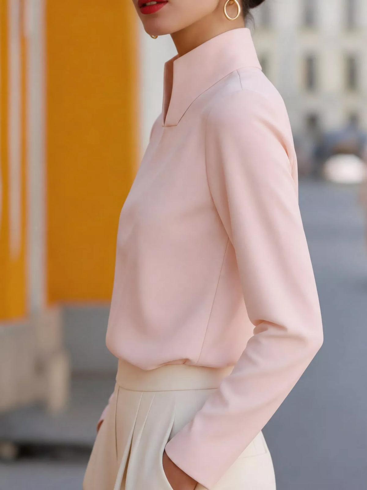 Mandarin neck long sleeve blouse, side view