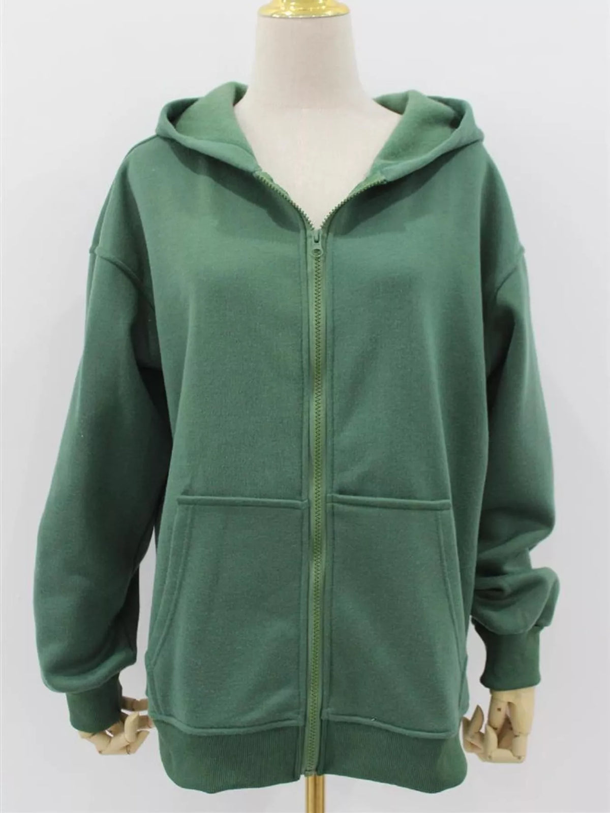 Women's Zip-Up Dropped Shoulder Hoodie in green — mannequin front view