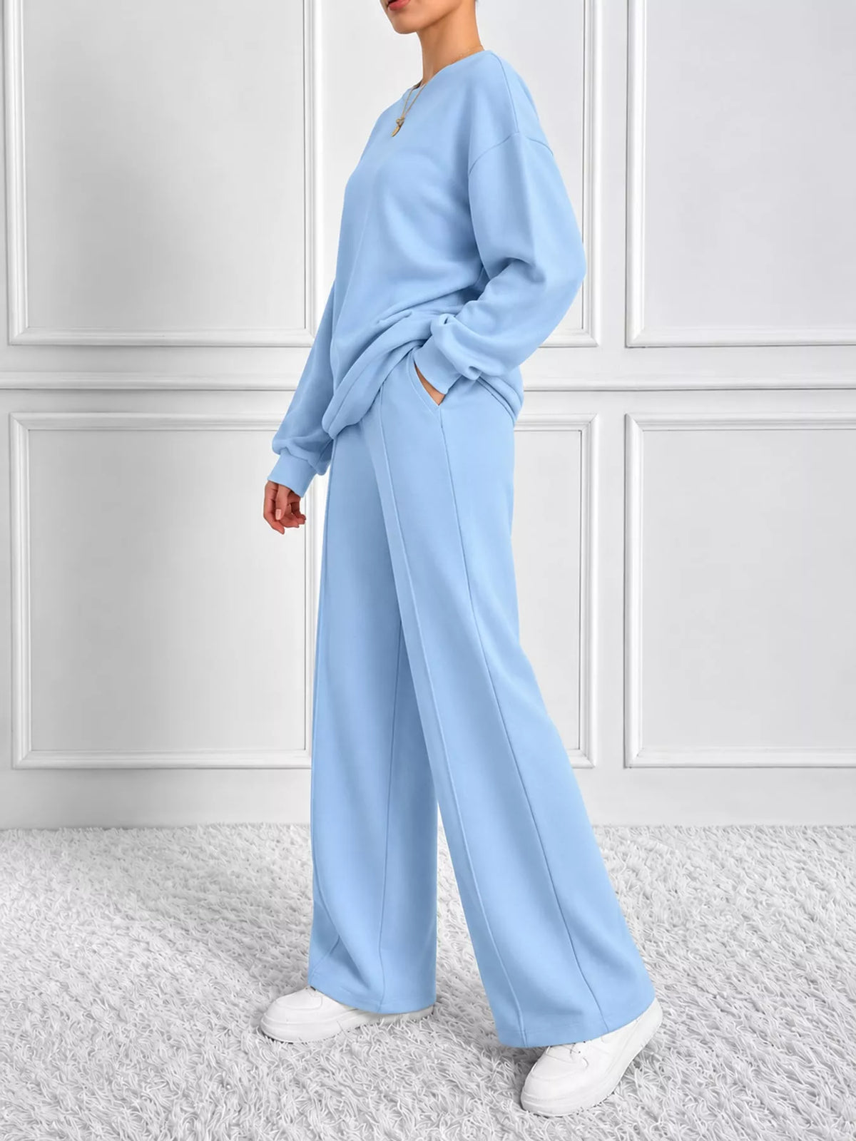 Blue oversized sweatshirt and wide-leg pants set — side view