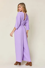Trendsi Double Take Full Size Surplice Wide Leg Jumpsuit with Pockets -