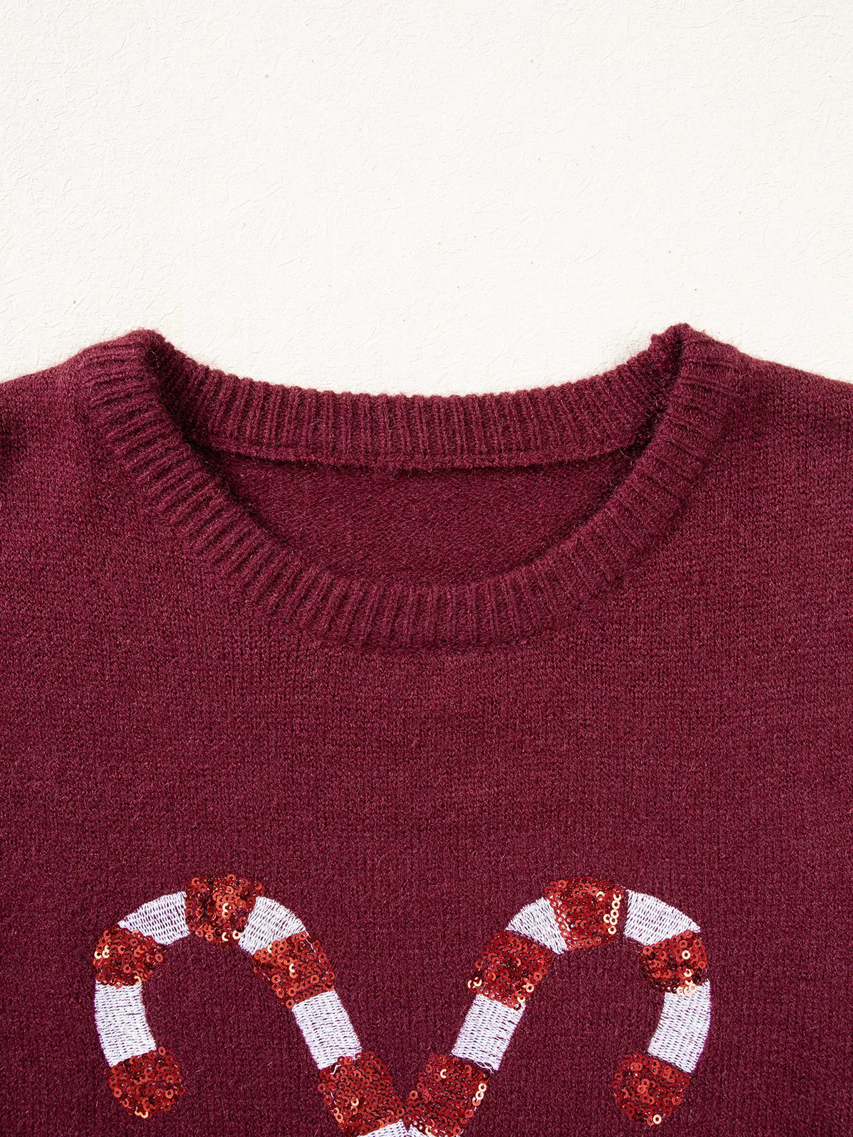 Burgundy christmas sequin candy cane sweater — design and construction details