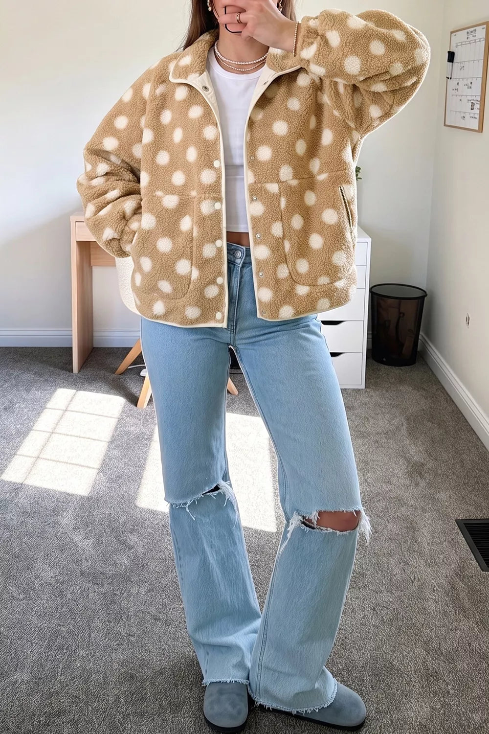 Tan and white polka dot faux fur button-front jacket with zip pockets