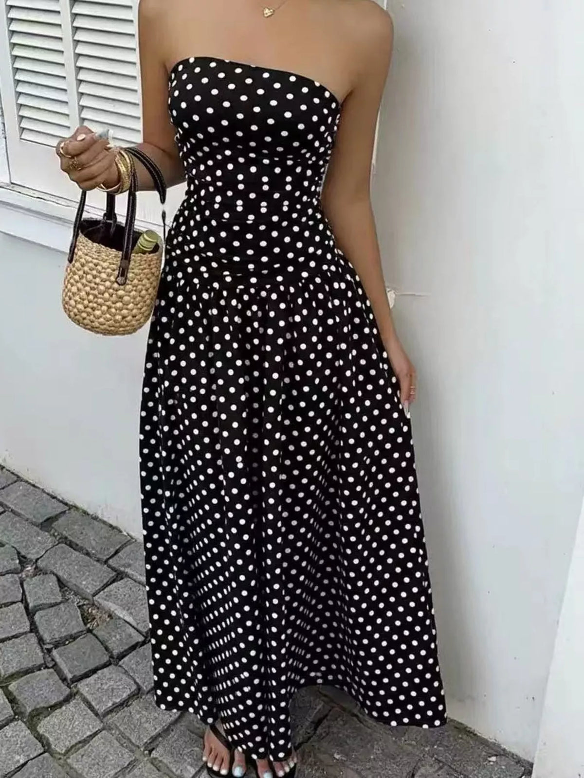 Women's Strapless Polka Dot Ruched Maxi Dress in black dots — front view
