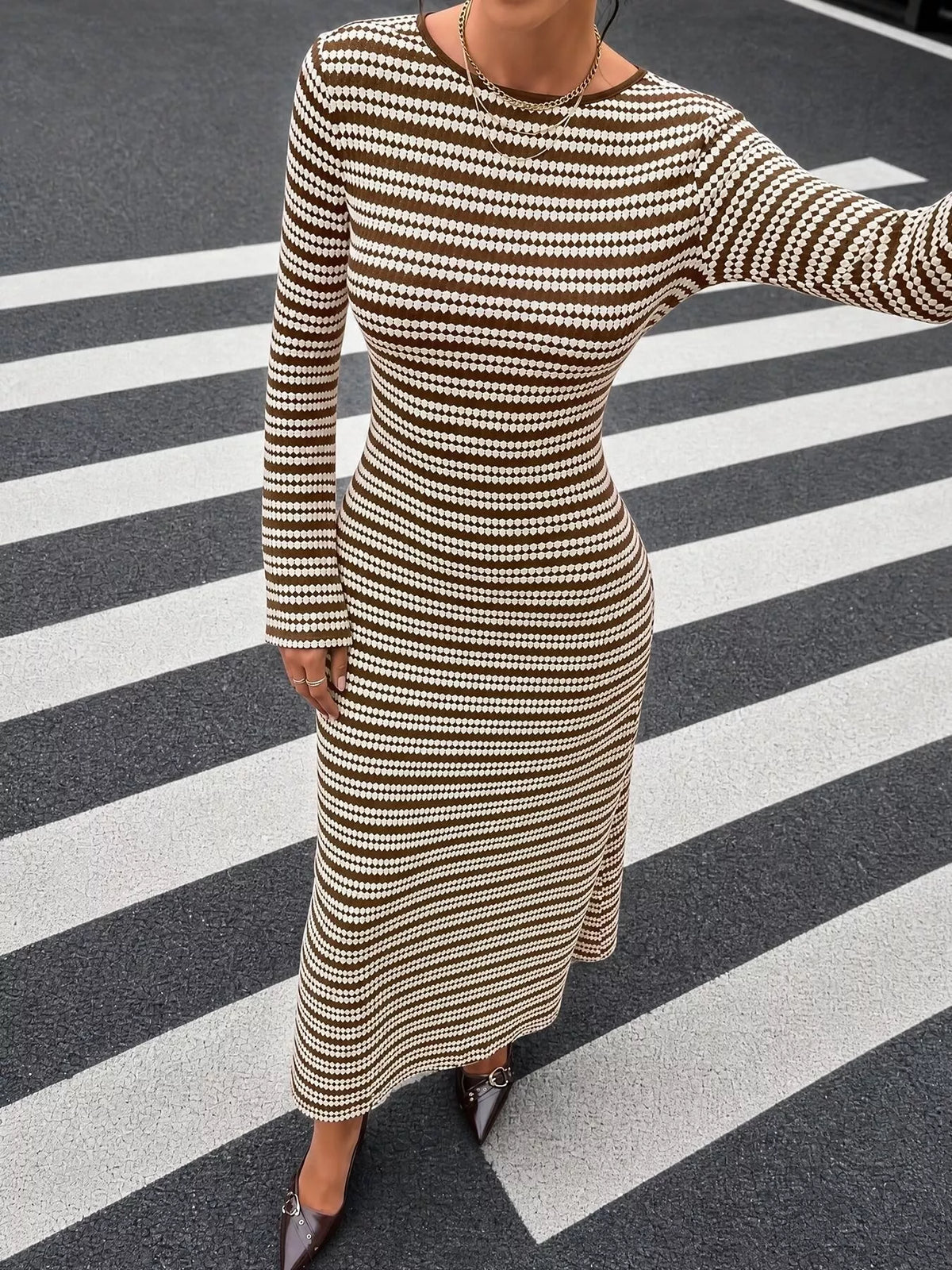 Brown and white striped flare sleeve knit dress, sleeve and skirt view
