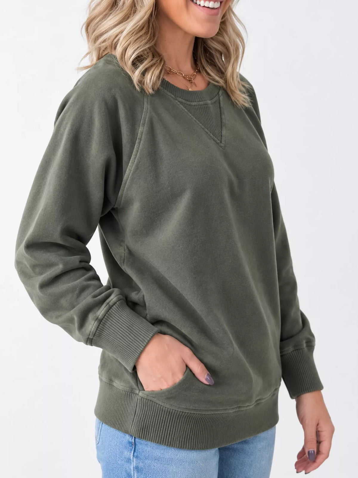 Green crew neck raglan sleeve sweatshirt, side view