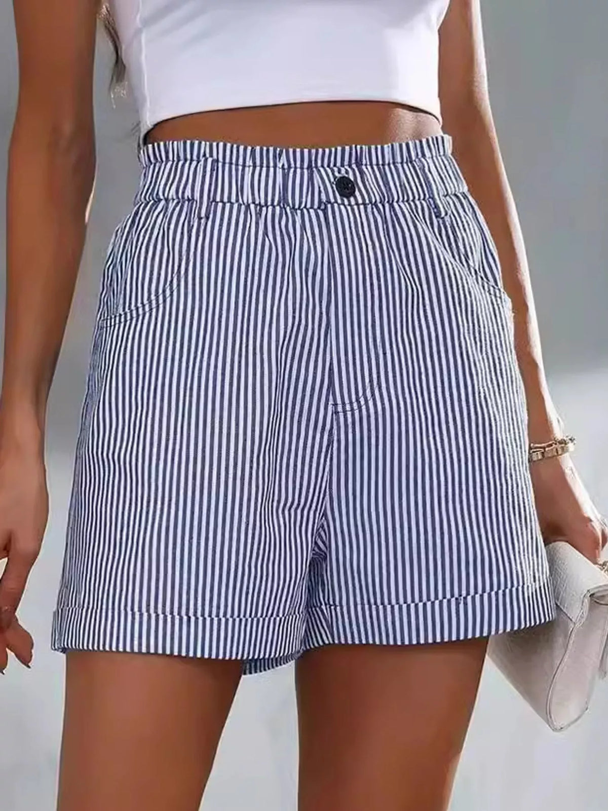 Blue and white high waisted striped shorts, front view