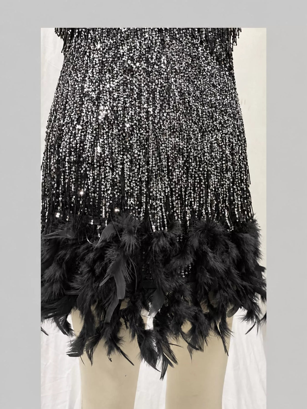 Black feather fringe sequin mini dress, detail view