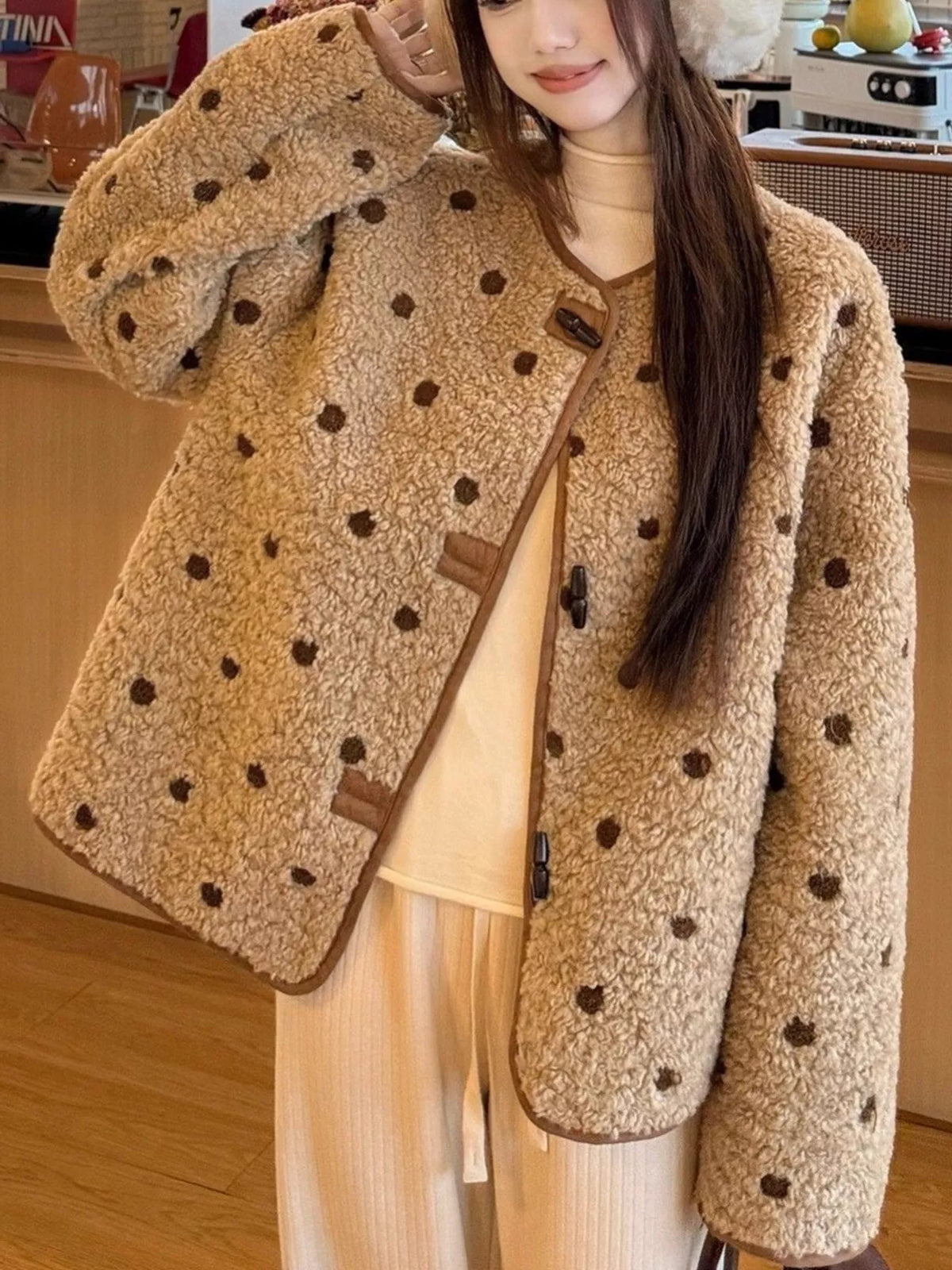 Beige with brown polka dots polka dot toggle jacket, front view