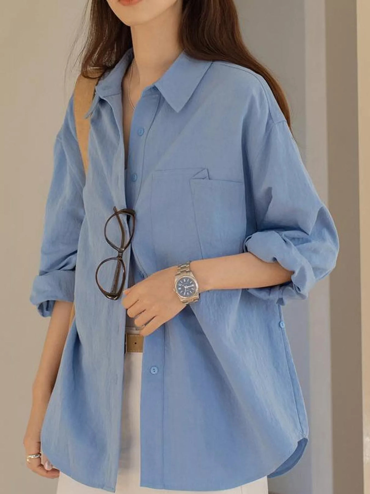 Blue button down long sleeve shirt, front view