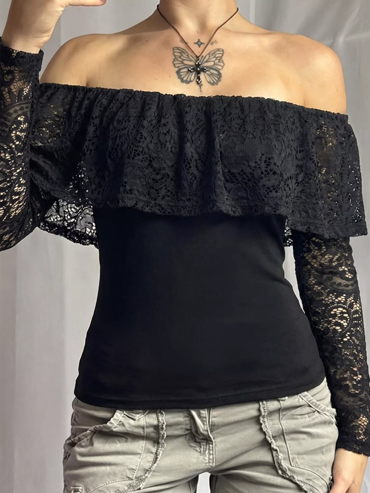 Off-Shoulder Lace Flounce Long-Sleeve Top in black, front view