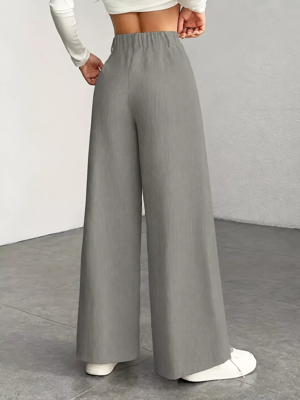 Gray high-waisted wide-leg pants, back view