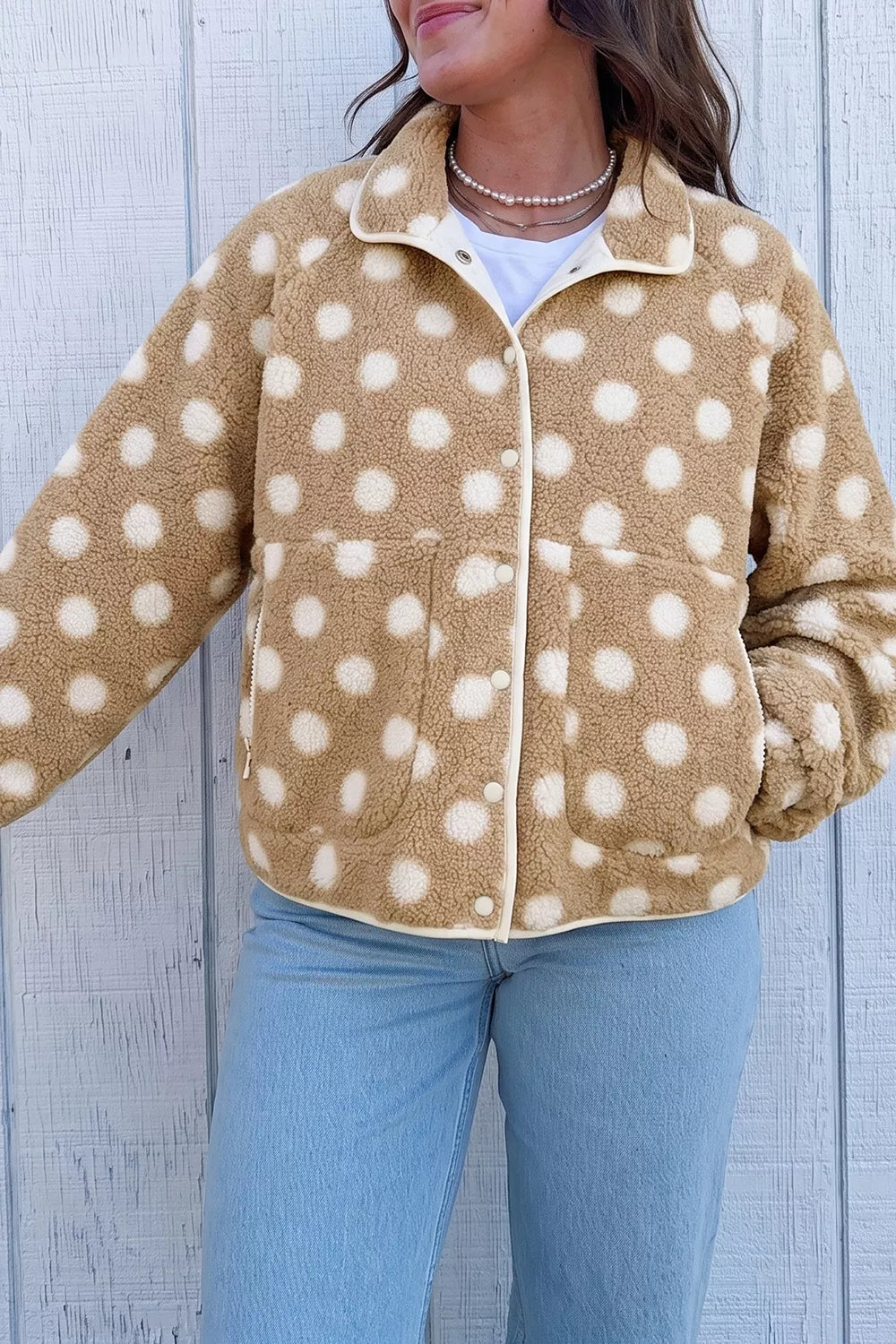 Tan and white polka dot faux fur button-front jacket with zip pockets