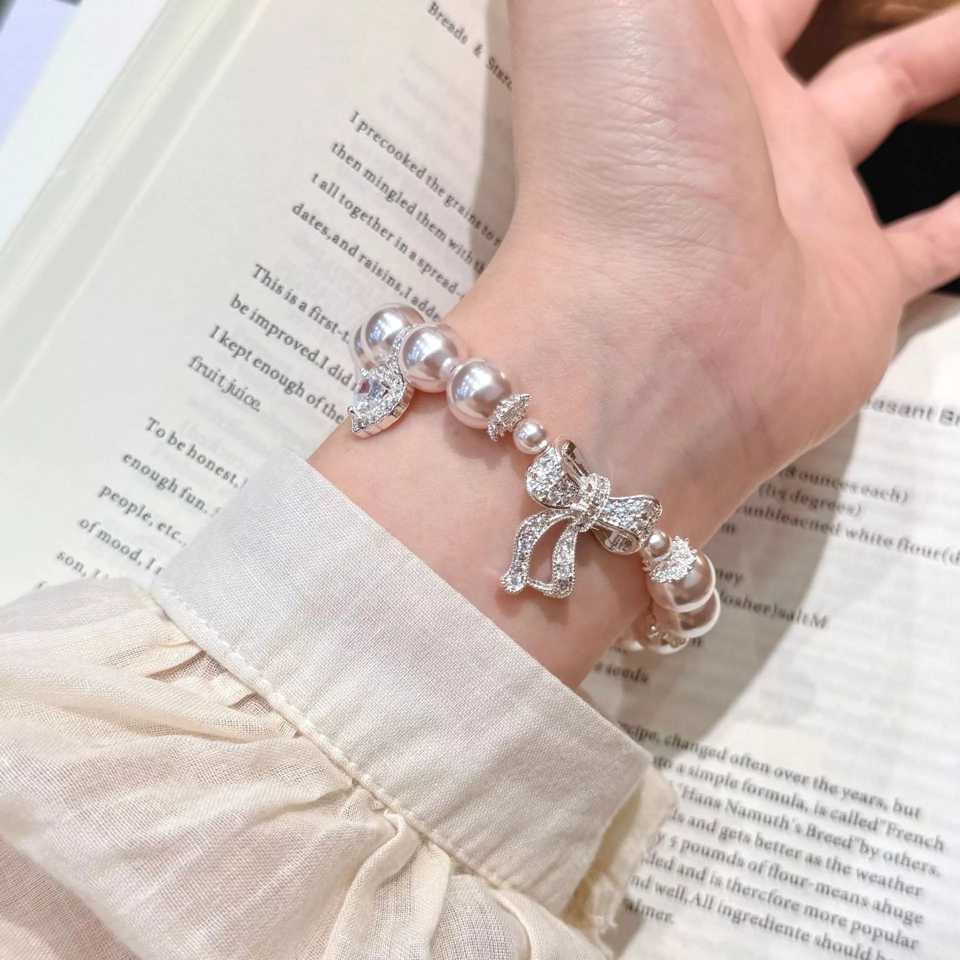 Trendsi Pearl Bracelet with Bow Charm -